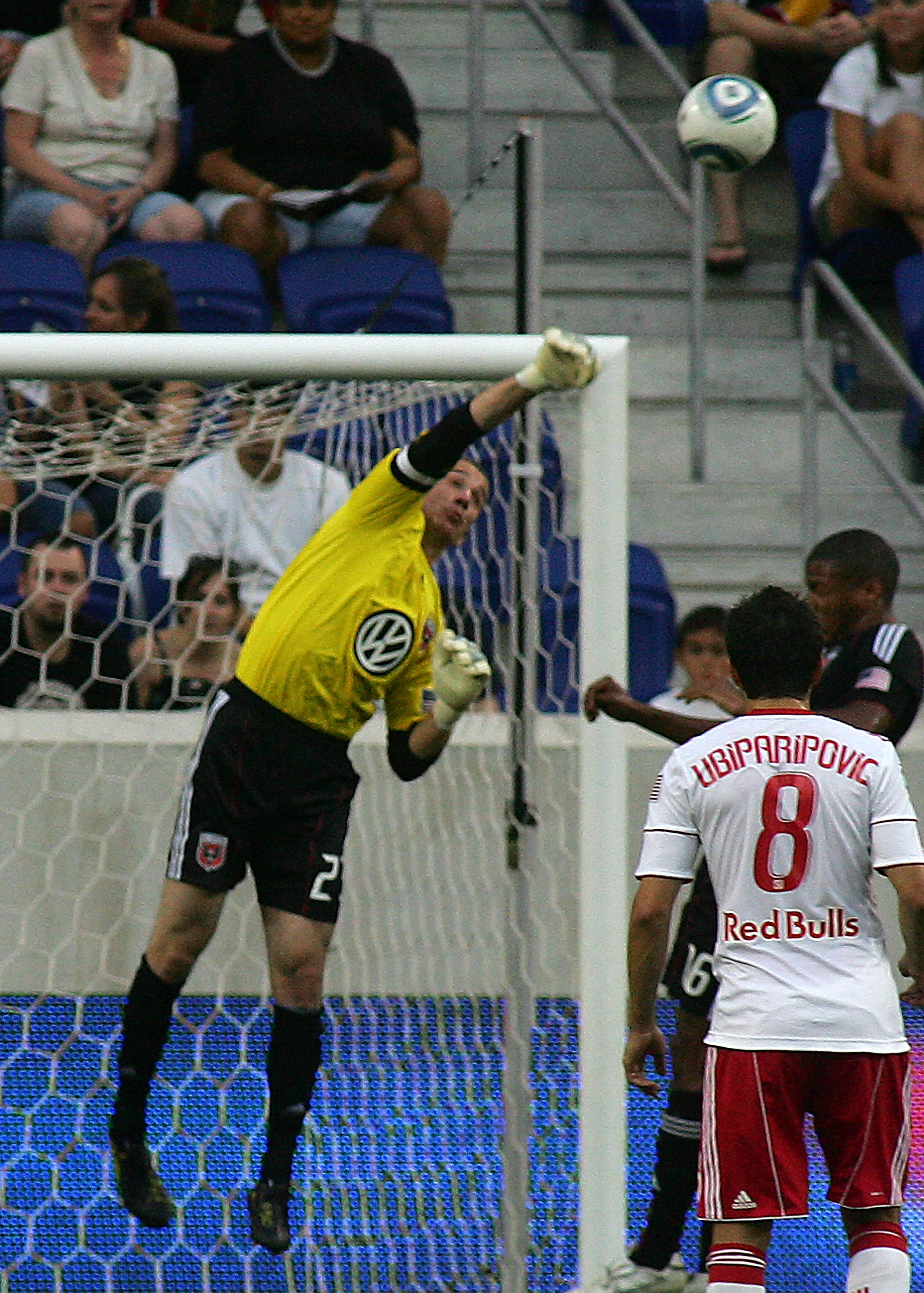 HARRISON, NJ - JULY 10: Golakeeper Troy Perkins #23 of D.C. United punches the ball out of his zone against the New York Red Bulls during their game at Red Bull Arena on July 10, 2010 in Harrison, New Jersey.  (Photo by Andy Marlin/Getty Images)