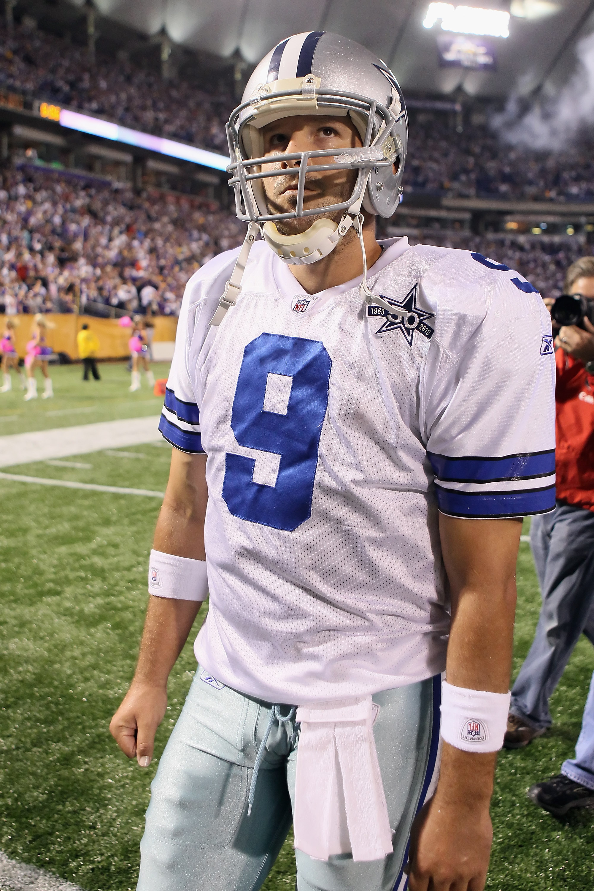MINNEAPOLIS - OCTOBER 17:  Quarterback Tony Romo #9 of the Dallas Cowboys walks off the field following the game against the Minnesota Vikings at Mall of America Field on October 17, 2010 in Minneapolis, Minnesota. The Vikings defeated the Cowboys 24-21.