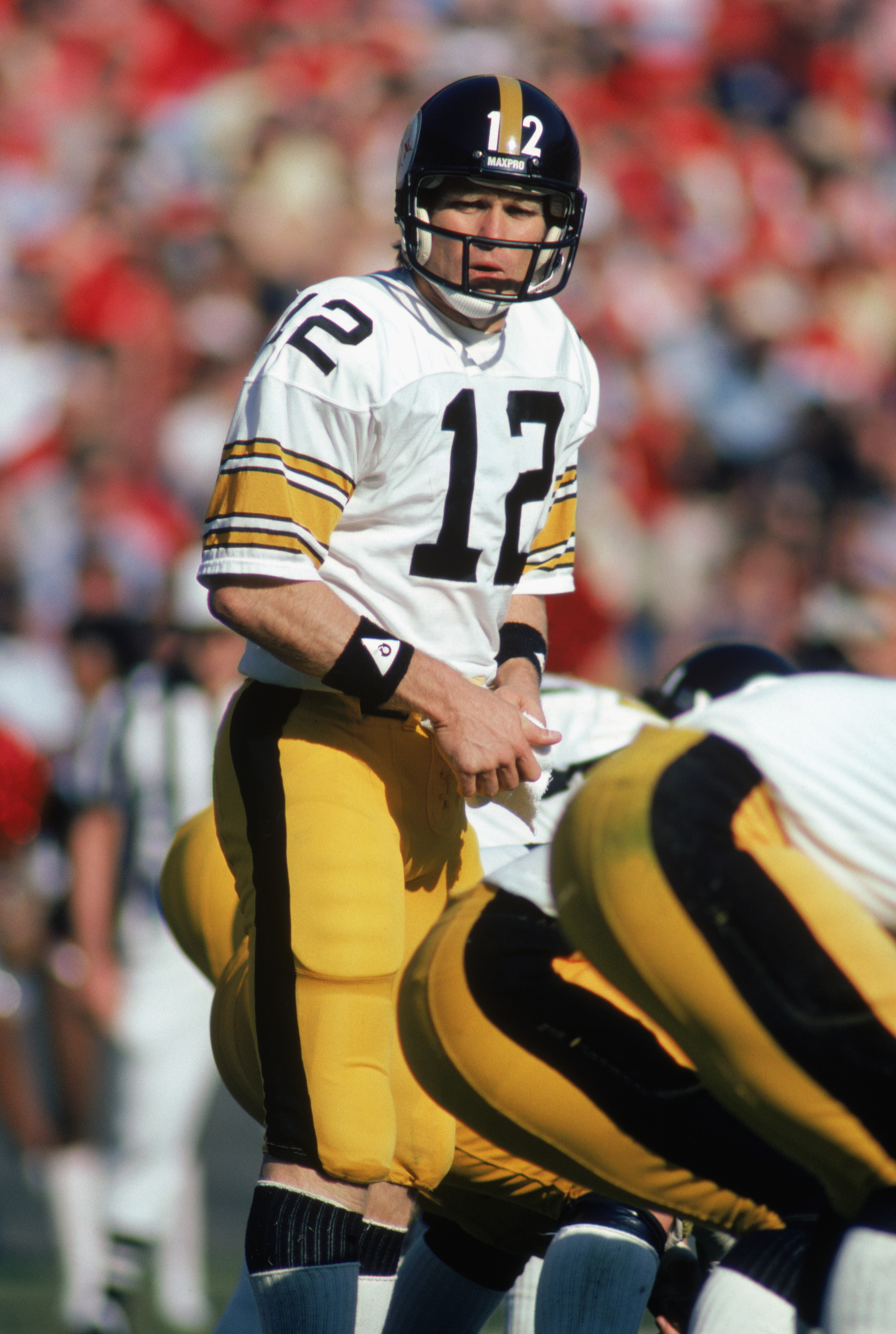 ATLANTA - NOVEMBER 1:  Quarterback Terry Bradshaw #12 of the Pittsburgh Steelers calls the play during the game against the Atlanta Falcons at Fulton County Stadium on November 1, 1981 in Atlanta, Georgia. The Steelers defeated the Falcons 34-20.  (Photo