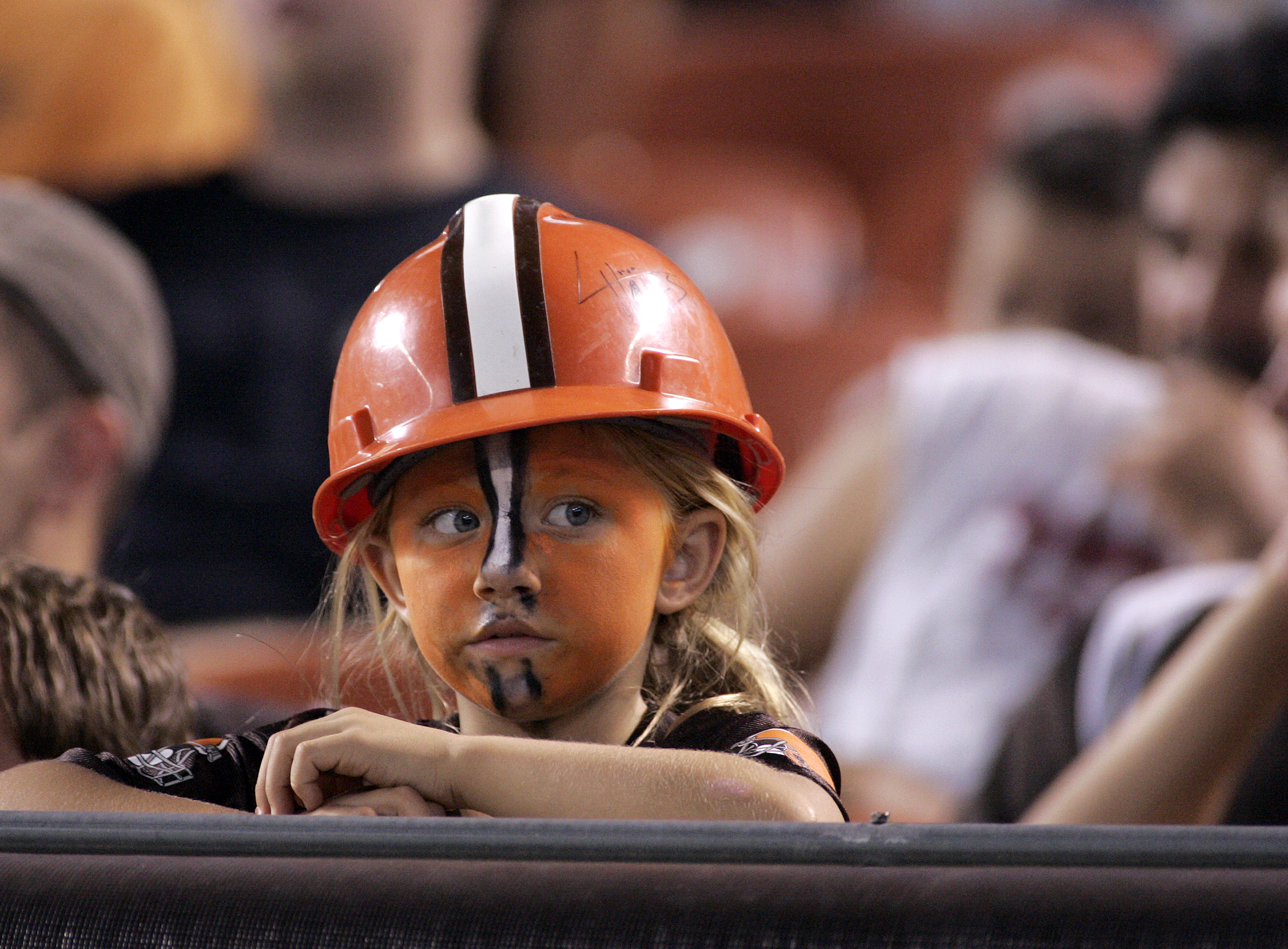 CLEVELAND - SEPTEMBER 2:  A young Cleveland Browns fan looks on during the preseason game against the Chicago Bears on September 2, 2010 at Cleveland Browns Stadium in Cleveland, Ohio. The Browns defeated the Bears 13-10.  (Photo by Justin K. Aller/Getty