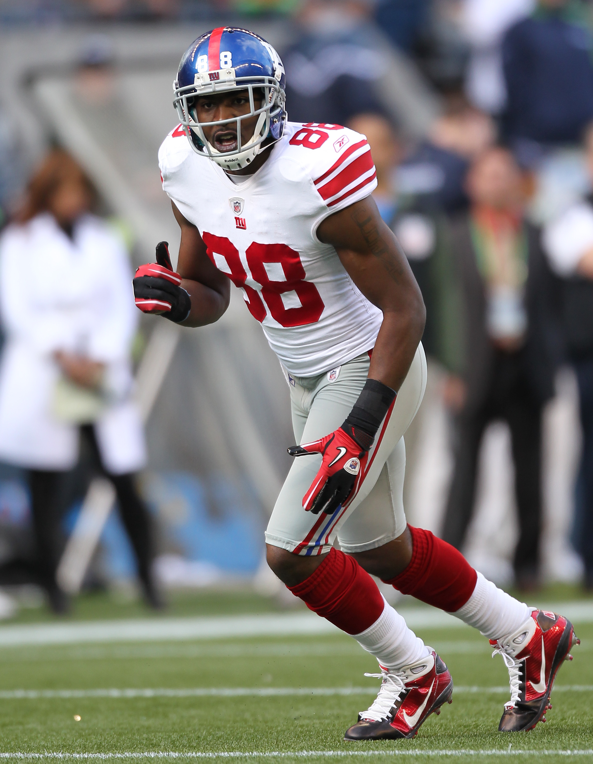 New York Giants wide receiver Hakeem Nicks (88) and wide receiver Mario  Manningham (82) celebrate Manningham's touchdown during second quarter NFL  action between the New York Giants and Detroit Lions at the