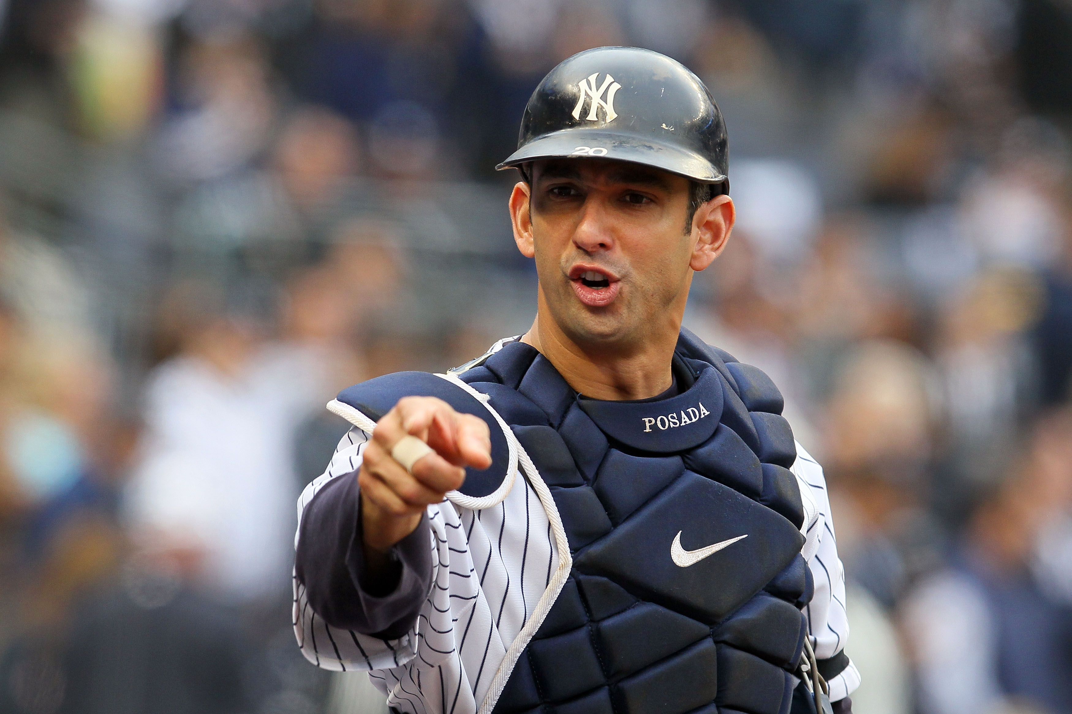 NEW YORK - OCTOBER 20:  Jorge Posada #20 of the New York Yankees gestures towards the dugout against the Texas Rangers in Game Five of the ALCS during the 2010 MLB Playoffs at Yankee Stadium on October 20, 2010 in the Bronx borough of New York City.  (Pho