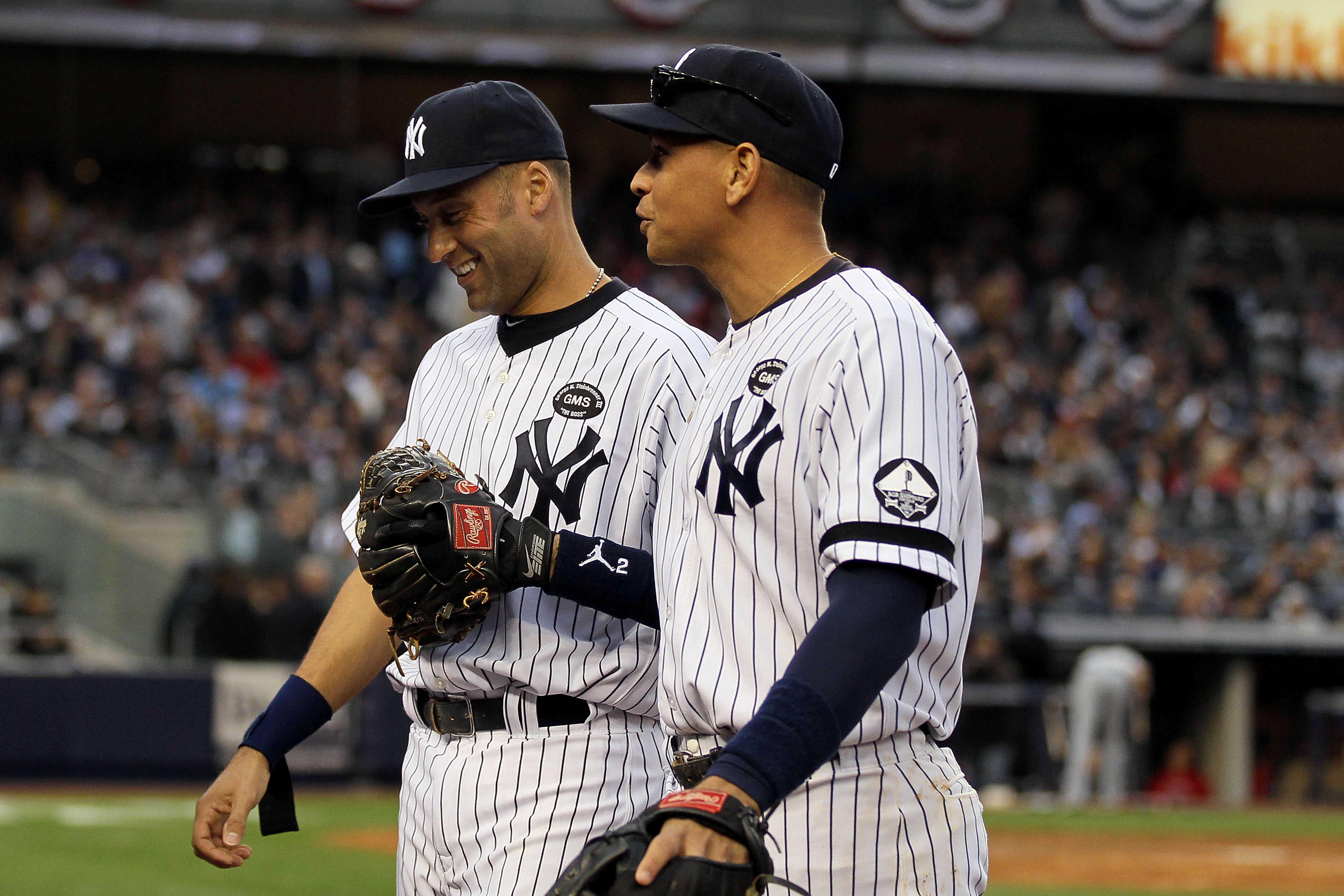 NEW YORK - OCTOBER 20:  (L-R)  Derek Jeter #2 and Alex Rodriguez #13 of the New York Yankees walk back to the dugout at the end of the top of the fourth inning against the Texas Rangers in Game Five of the ALCS during the 2010 MLB Playoffs at Yankee Stadi