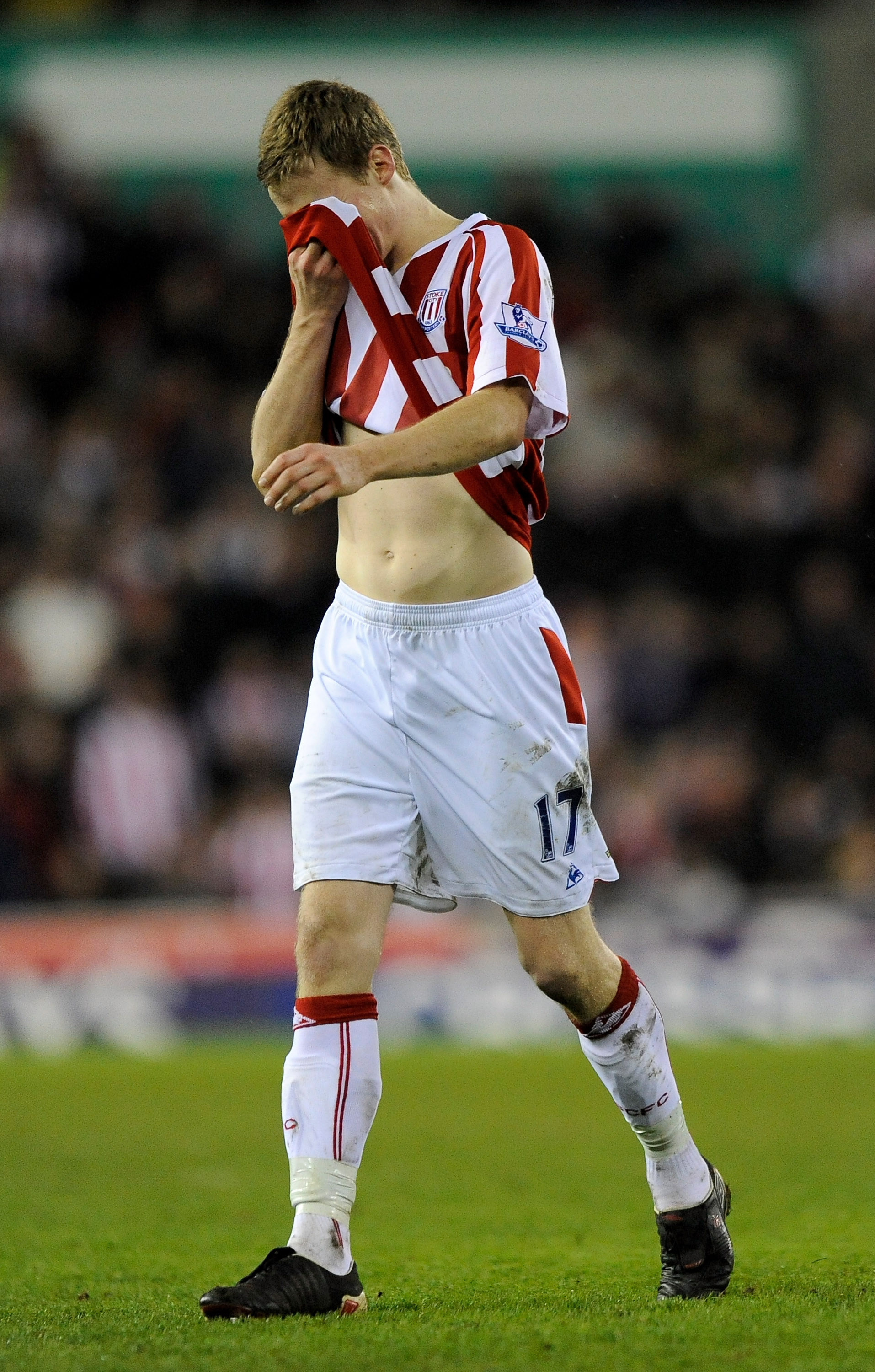 STOKE ON TRENT, ENGLAND - FEBRUARY 27:  Ryan Shawcross of Stoke City leaves the pitch in tears after being sent off for a challenge on Aaron Ramsey of Arsenal during the Barclays Premier League match between Stoke City and Arsenal at The Britannia Stadium