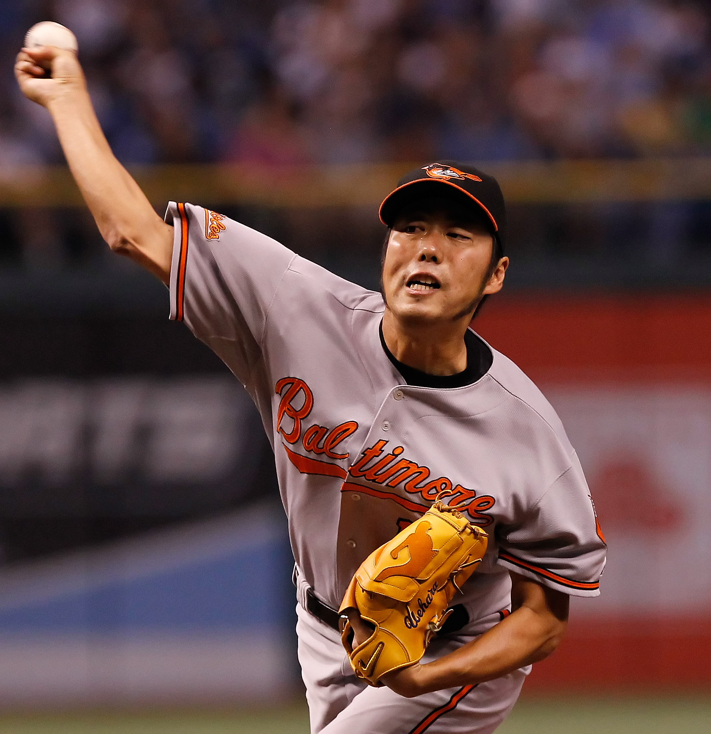 ST. PETERSBURG, FL - SEPTEMBER 29:  Relief pitcher Koji Uehara #19 of the Baltimore Orioles pitches against the Tampa Bay Rays at Tropicana Field on September 29, 2010 in St. Petersburg, Florida.  (Photo by J. Meric/Getty Images)