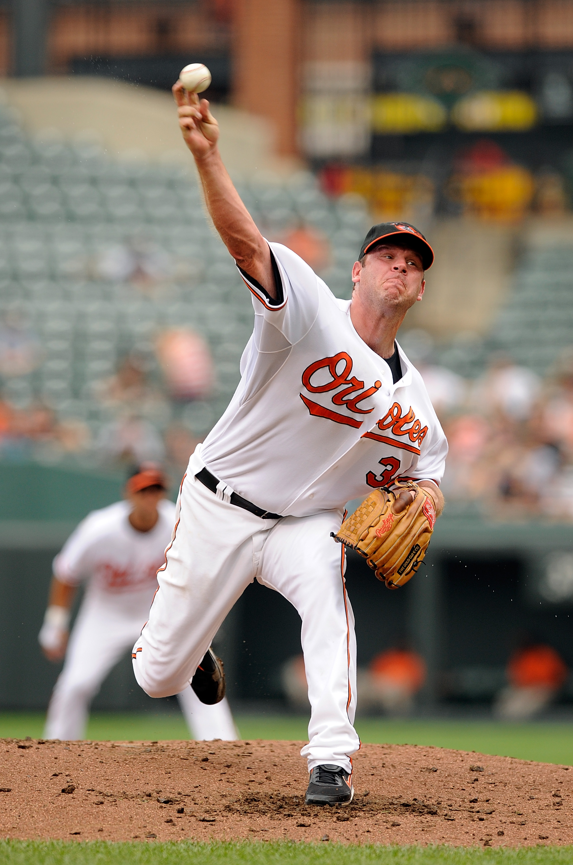 BALTIMORE - AUGUST 22:  Kevin Millwood #34 of the Baltimore Orioles pitches against the Texas Rangers at Camden Yards on August 22, 2010 in Baltimore, Maryland.  (Photo by Greg Fiume/Getty Images)