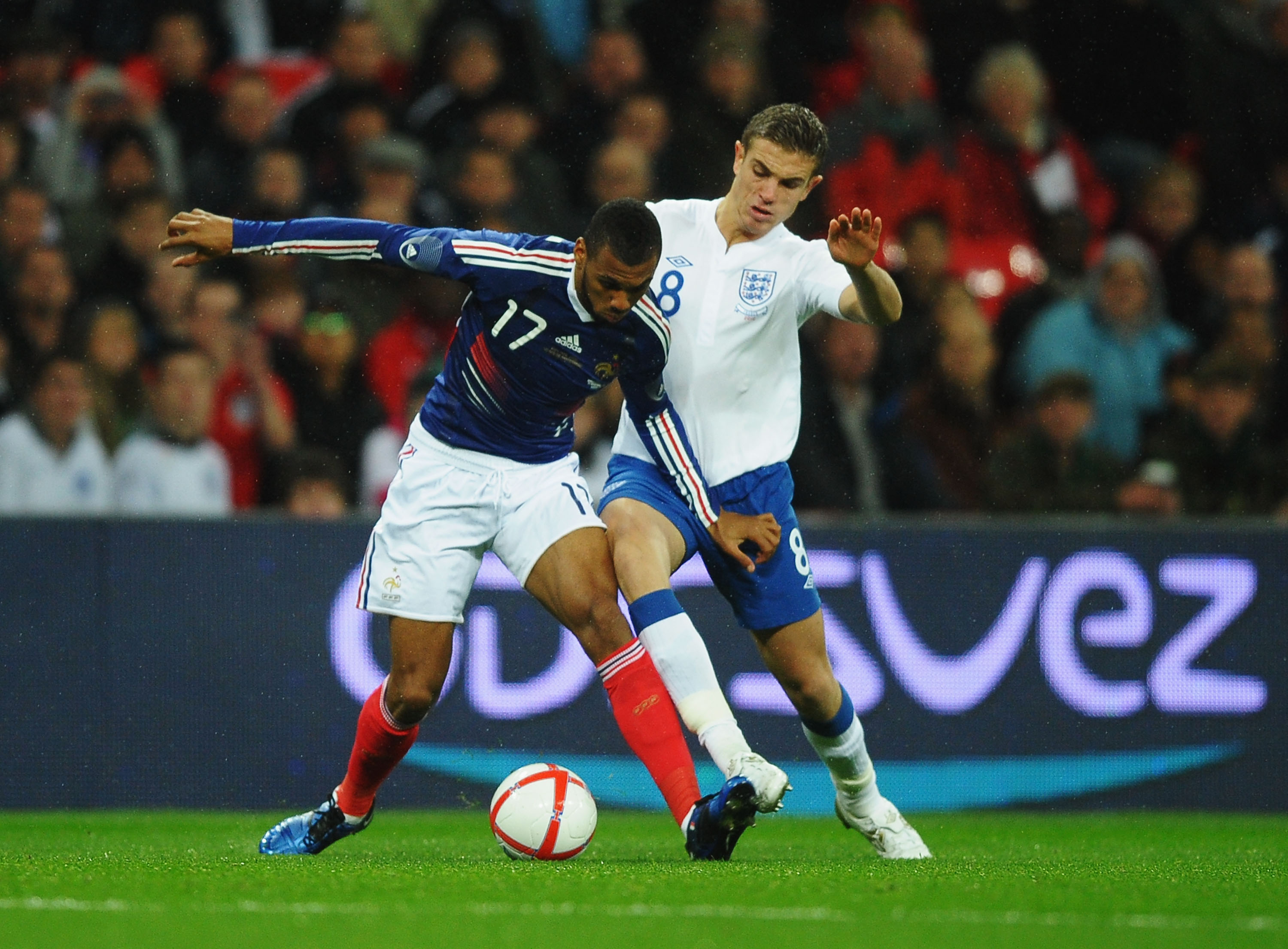 LONDON, ENGLAND - NOVEMBER 17:  Yann M'Vila (L) of France holds off the challenge of Jordan Henderson (R) of England during the international friendly match between England and France at Wembley Stadium on November 17, 2010 in London, England.  (Photo by