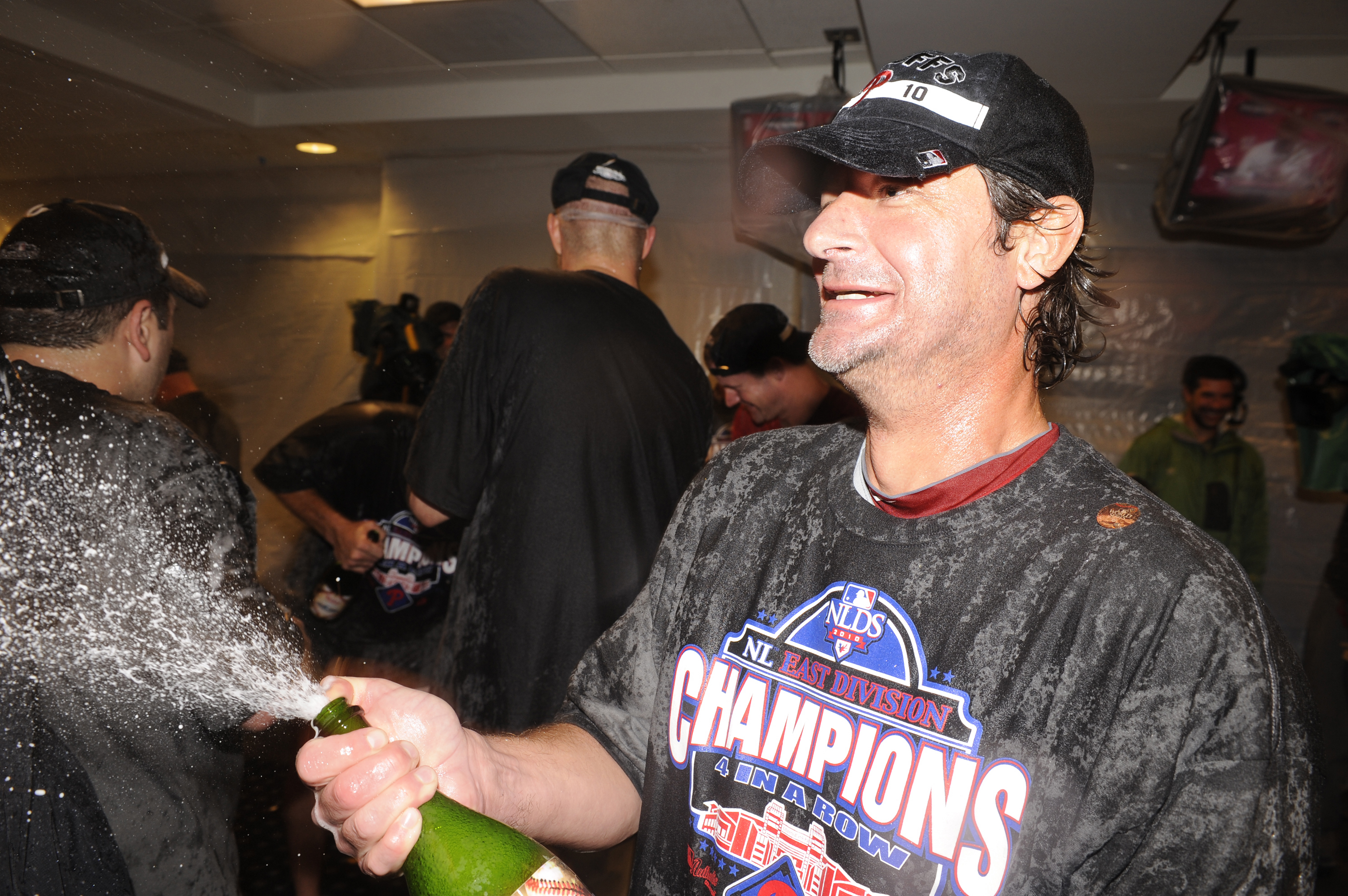WASHINGTON - SEPTEMBER 27:  Jamie Moyer of the Philadelphia Phillies celebrates clinching the National League EasT title after a baseball game against the Washington Nationals on September 27, 2010 at Nationals Park in Washington, D.C.  The Phillies won 8