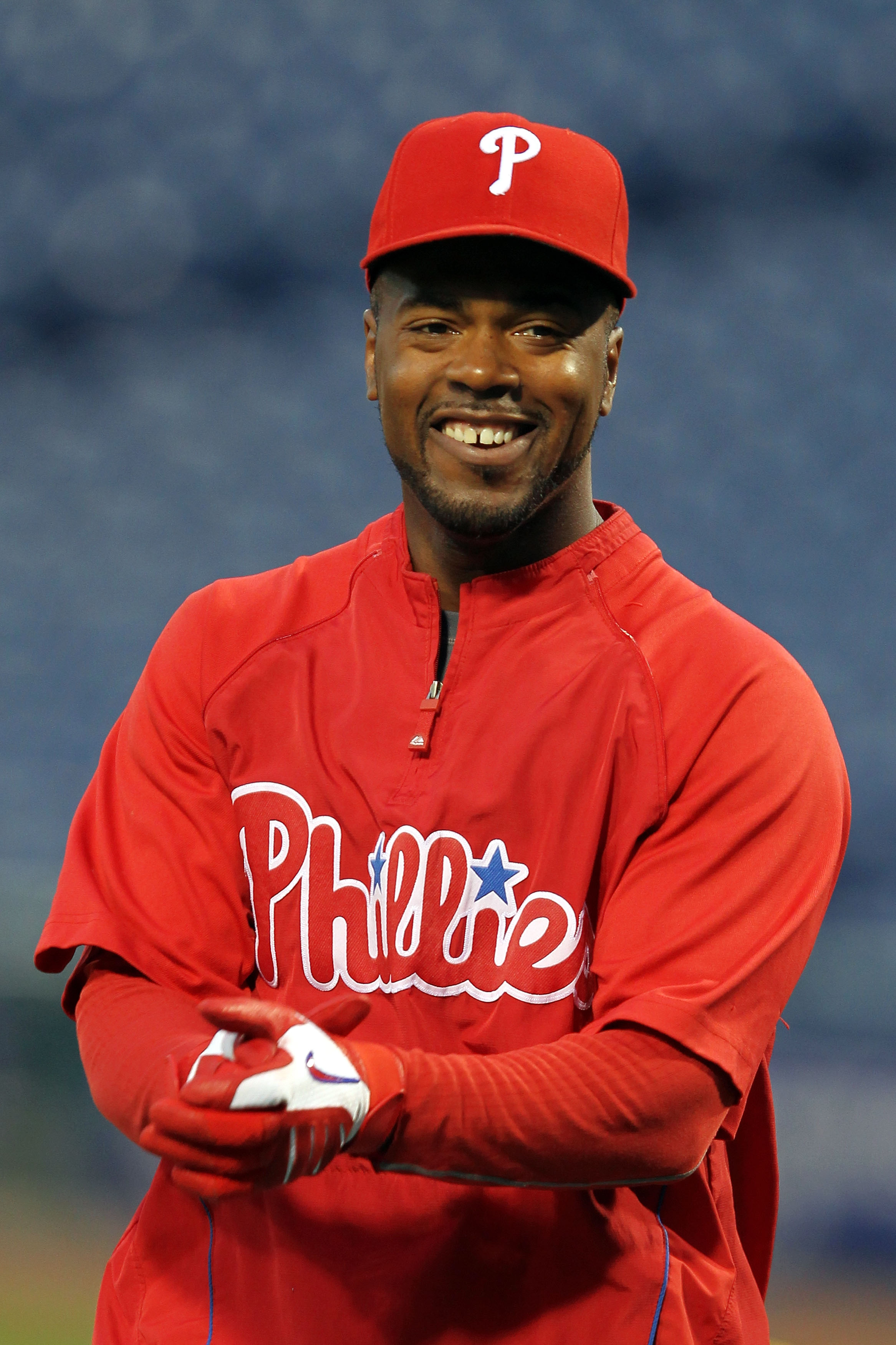 PHILADELPHIA - OCTOBER 23:  Jimmy Rollins #11 of the Philadelphia Phillies looks on during batting practice before Game Six of the NLCS during the 2010 MLB Playoffs at Citizens Bank Park on October 23, 2010 in Philadelphia, Pennsylvania.  (Photo by Al Bel