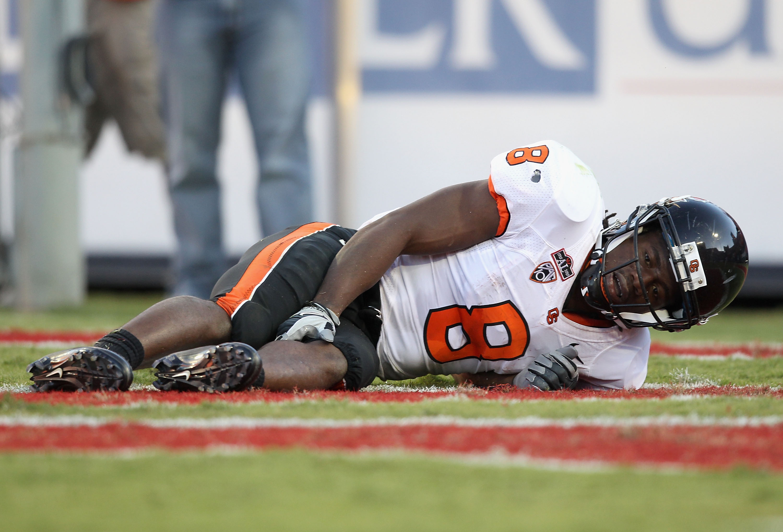 TUCSON, AZ - OCTOBER 09: Wide receiver James Rodgers #8 of the Oregon State Beavers lays injured on the field during the college football game against the Arizona Wildcats at Arizona Stadium on October 9, 2010 in Tucson, Arizona. The Beavers defeated the