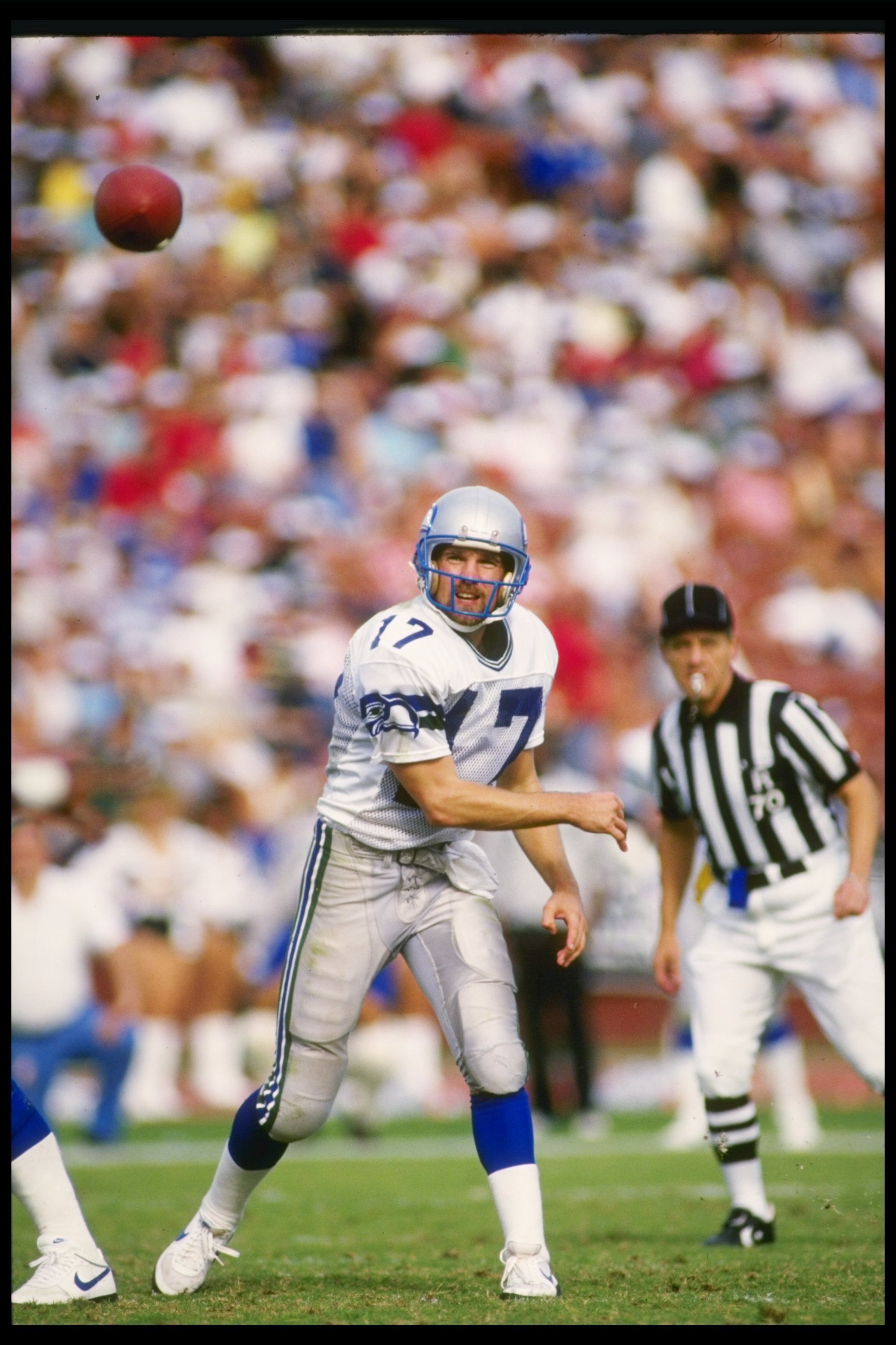 25 Oct 1987: Quarterback Dave Krieg of the Seattle Seahawks passes the ball during a game against the Los Angeles Raiders at the Los Angeles Memorial Coliseum in Los Angeles, California. The Seahawks won the game, 35-13.