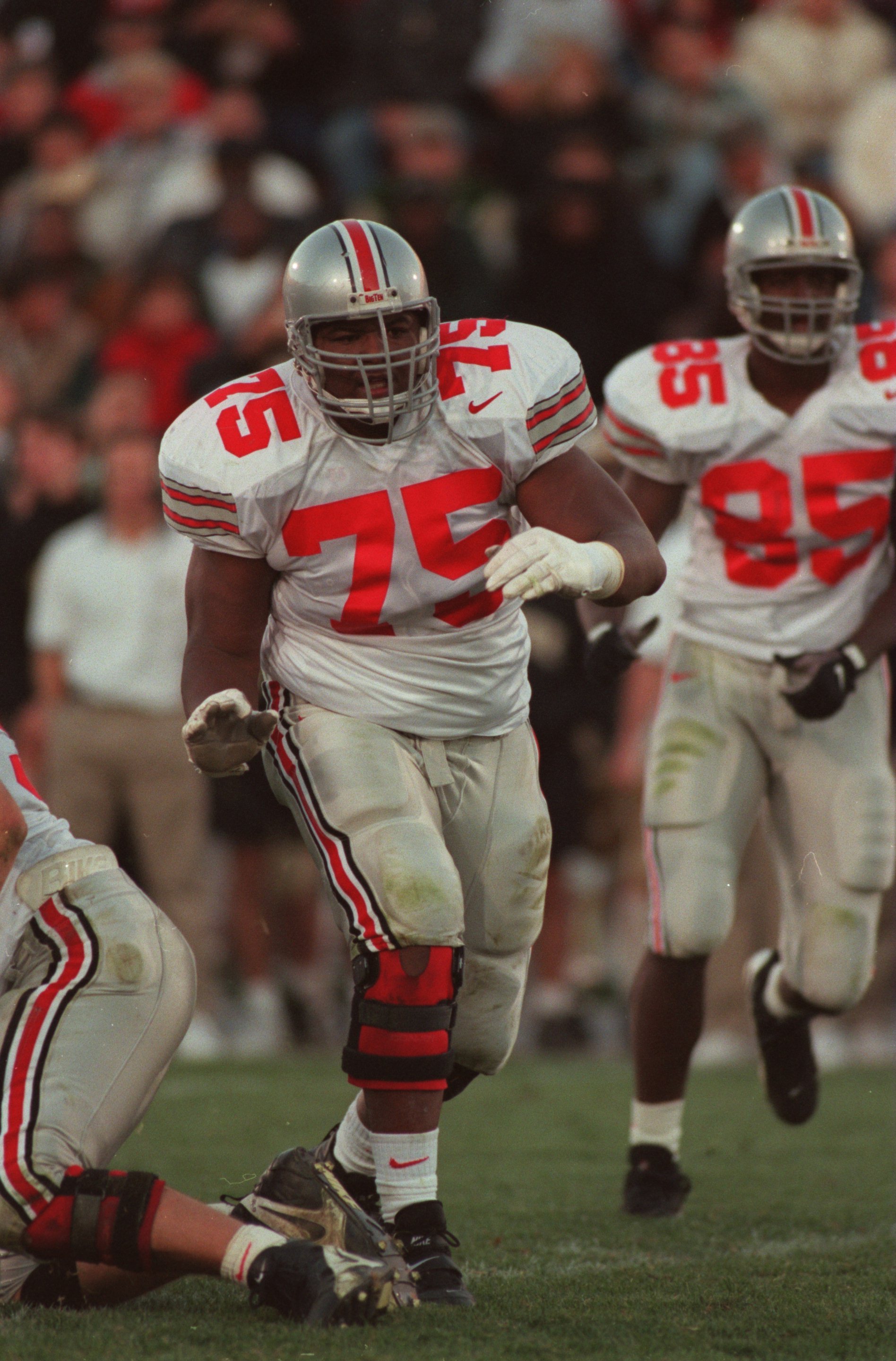 19 Oct 1996:  Offensive lineman Orlando Pace #75 of the Ohio State Buckeyes in action on the field as he leads through a hole in the offensive line to make a block during a play in the Buckeyes 42-14 victory over the Purdue Boilermakers at Ross Ade Stadiu