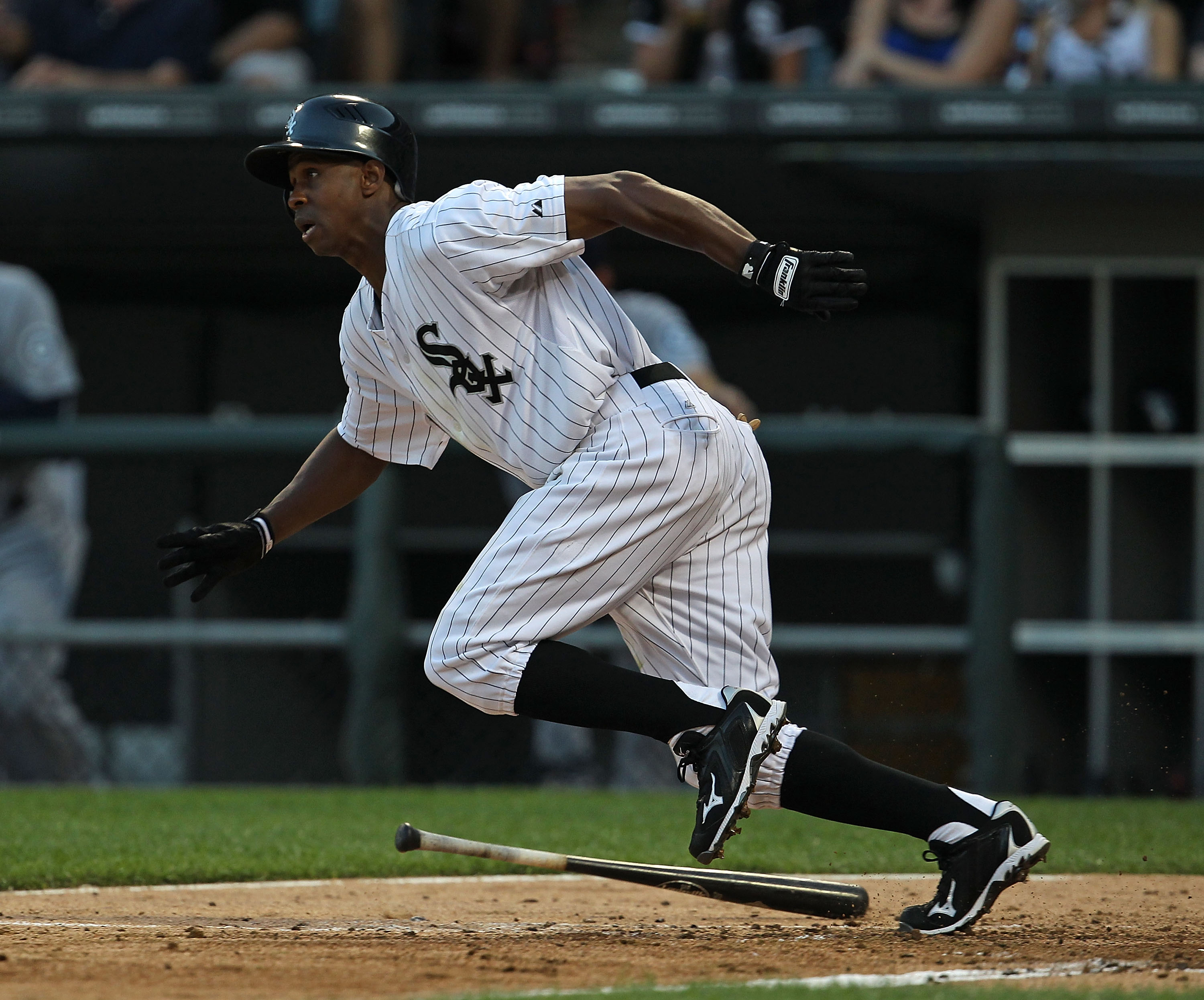 CHICAGO - JULY 26: Juan Pierre #1 of the Chicago White Sox runs after hitting the ball against the Seattle Mariners at U.S. Cellular Field on July 26, 2010 in Chicago, Illinois. The White Sox defeated the Mariners 6-1. (Photo by Jonathan Daniel/Getty Imag