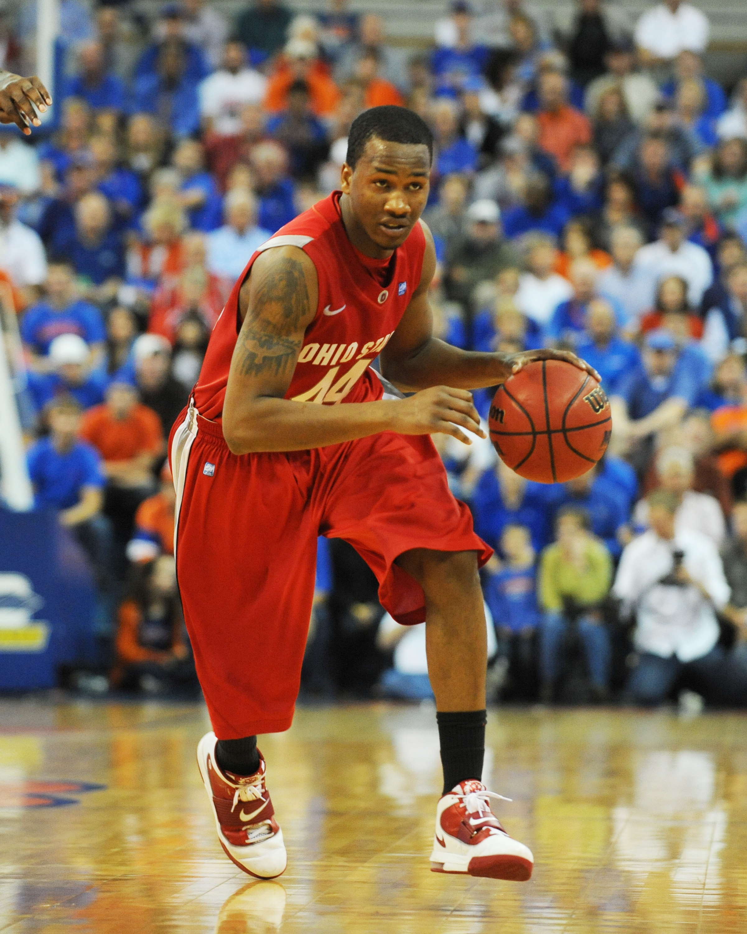 GAINESVILLE, FL - NOVEMBER 16: Guard William Buford #44 of the Ohio State Buckeyes drives upcourt against the Florida Gators November 16, 2010 at the Stephen C. O'Connell Center in Gainesville, Florida.  (Photo by Al Messerschmidt/Getty Images)