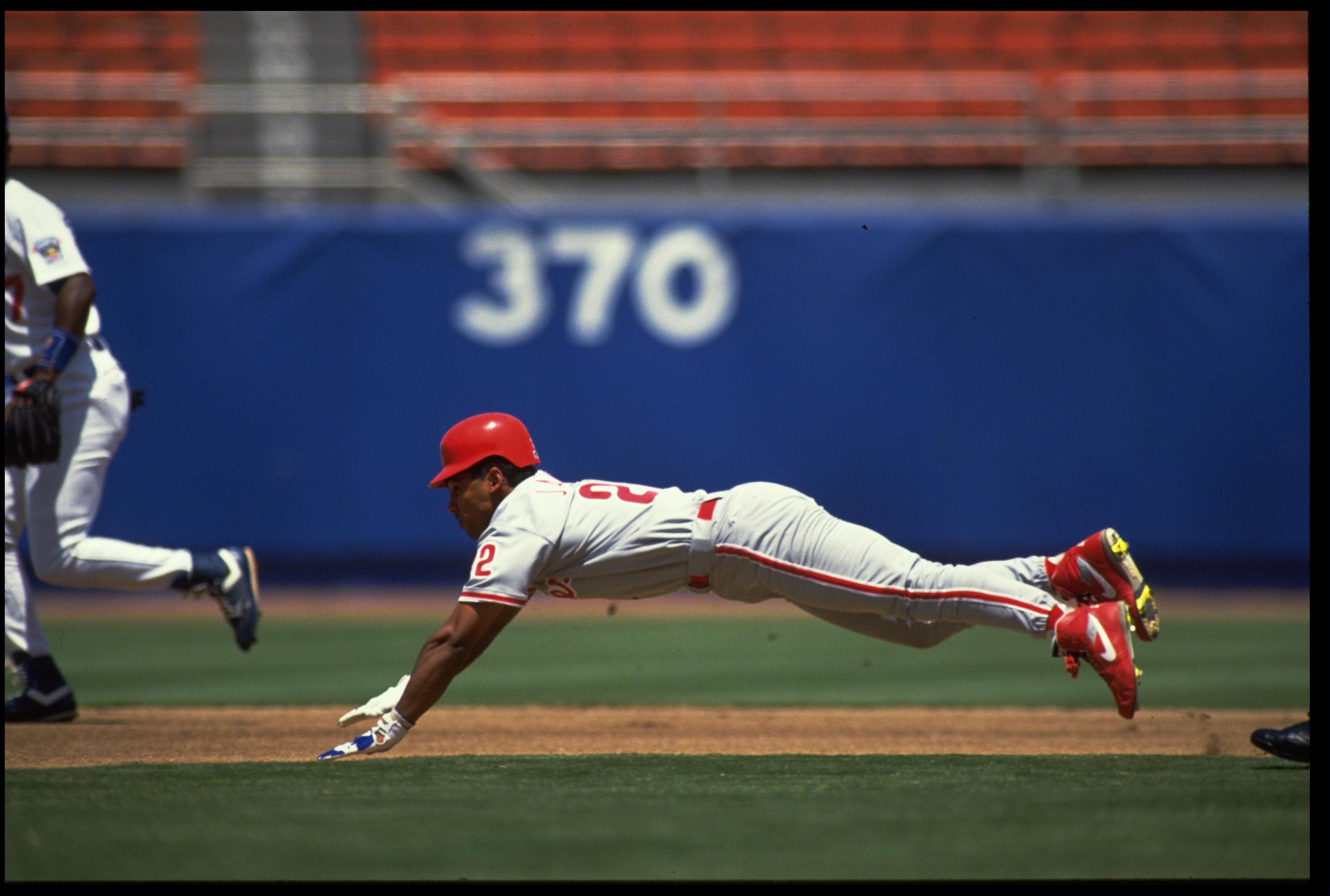 5 JUL 1992:  STAN JAVIER OF THE PHILADELPHIA PHILLIES SLIDES HEAD-FIRST DURING THEIR GAME AGAINST THE LOS ANGELES DODGERS AT DODGER STADIUM IN LOS ANGELES, CALIFORNIA.  MANDATORY CREDIT: STEPHEN DUNN/ALLSPORT