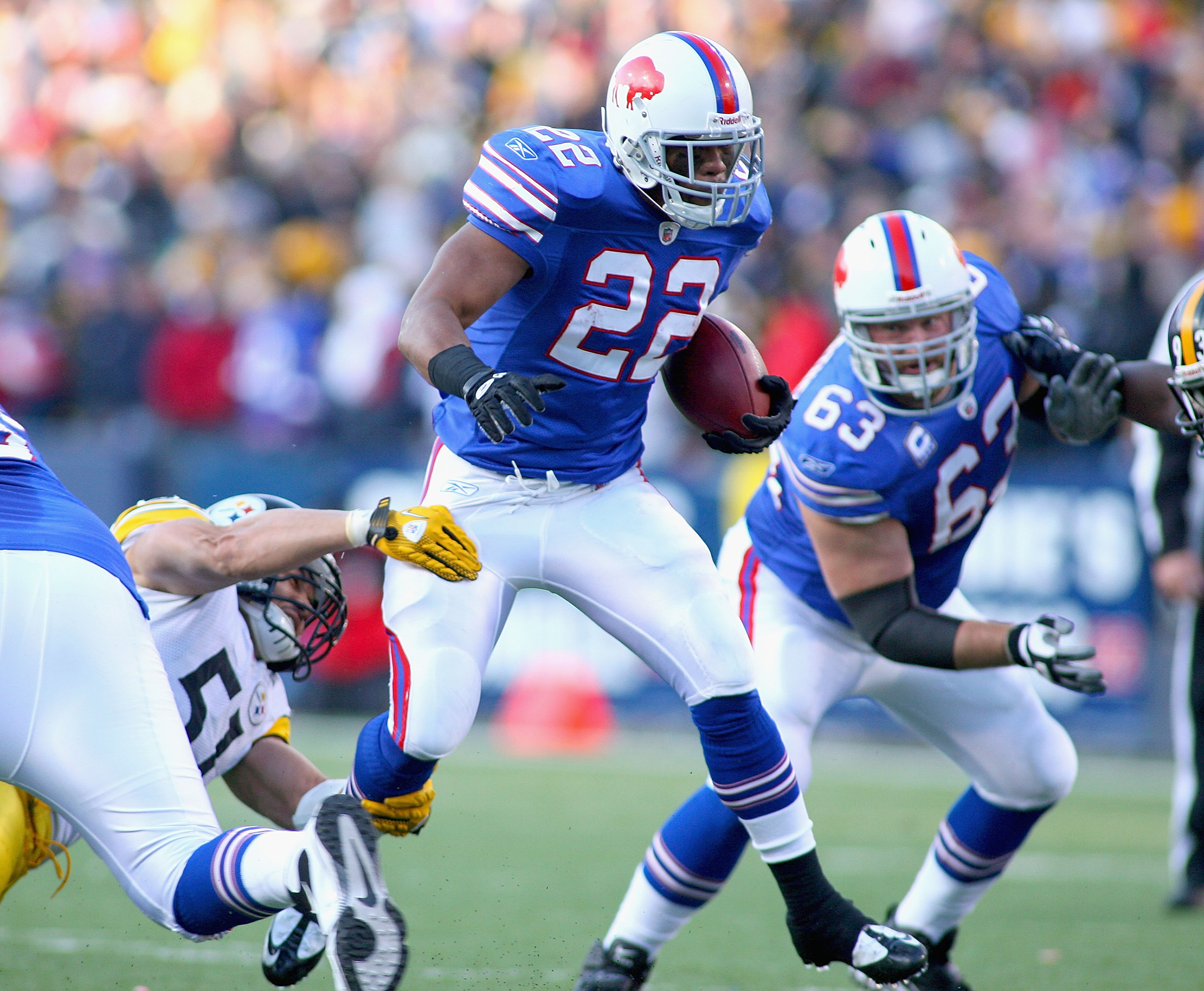 Buffalo Bills tackle Daryl Williams (75) runs onto the field prior to the  start of the first half of an NFL football game against the Pittsburgh  Steelers in Orchard park, N.Y., Sunday