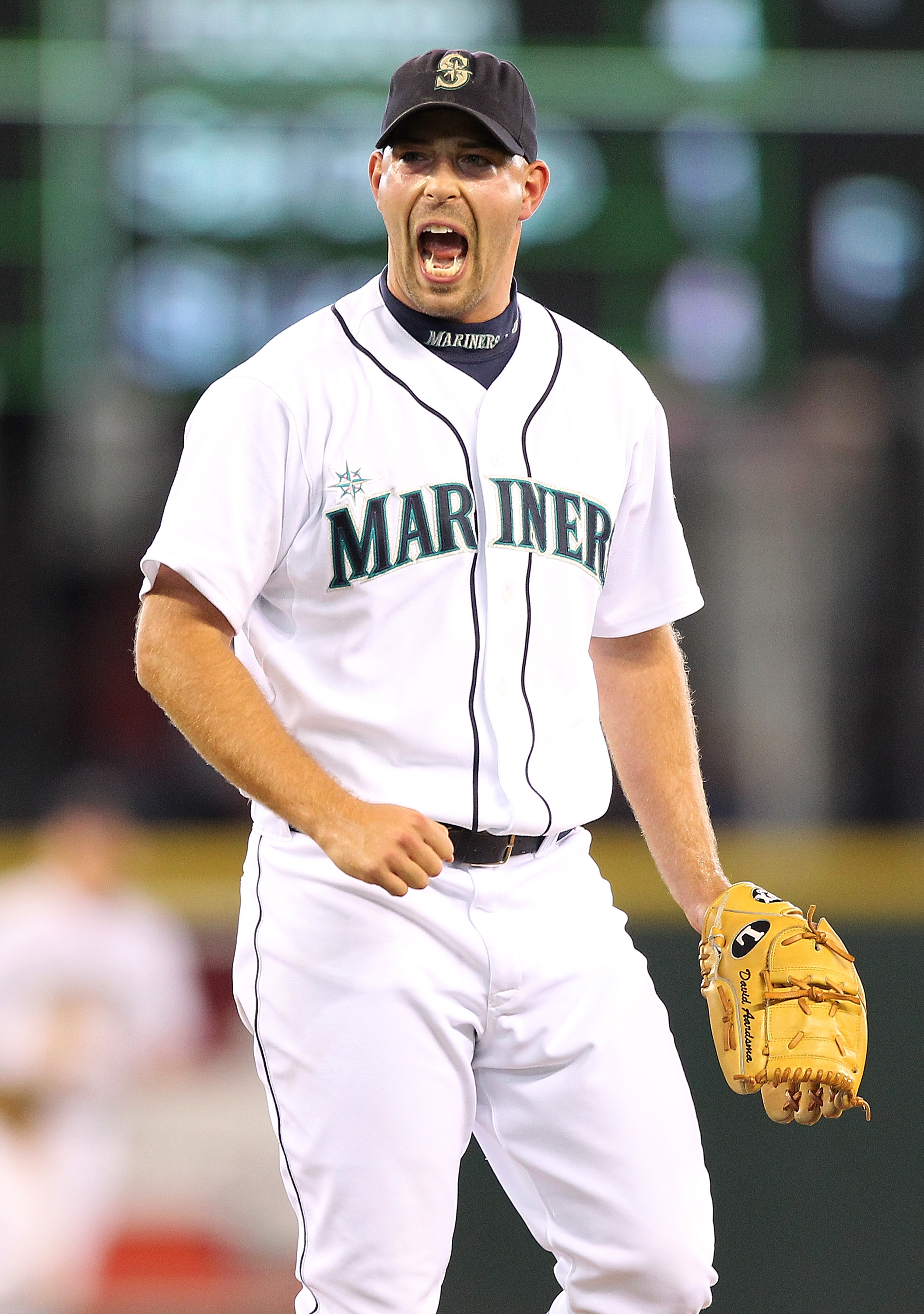SEATTLE - SEPTEMBER 19:  Closing pitcher David Aardsma #53 of the Seattle Mariners reacts after defeating the Texas Rangers 2-1 at Safeco Field on September 19, 2010 in Seattle, Washington. (Photo by Otto Greule Jr/Getty Images)