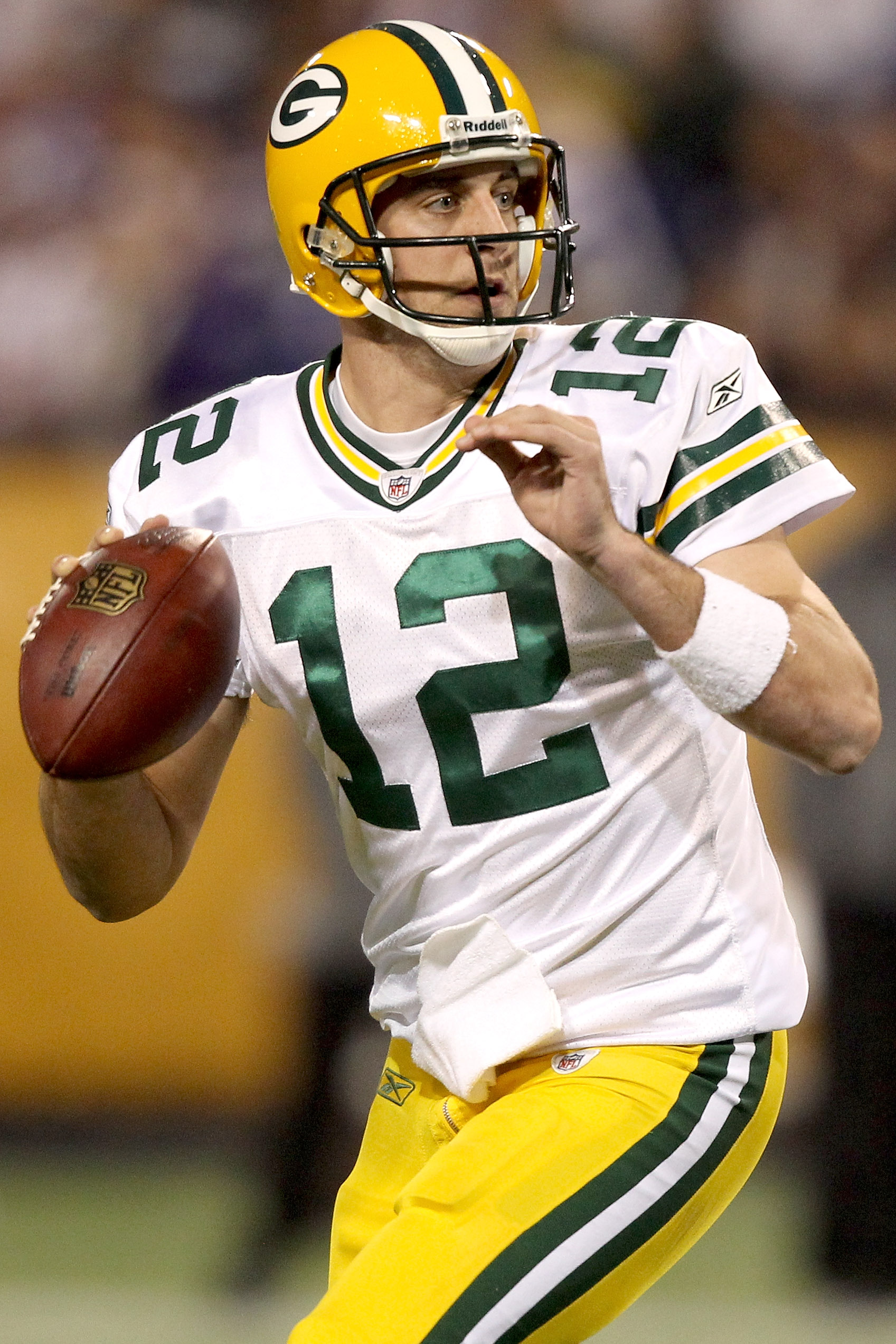 MINNEAPOLIS - NOVEMBER 21:  Quarterback Aaron Rodgers #12 of the Green Bay Packers throws against the Minnesota Vikings at the Hubert H. Humphrey Metrodome on November 21, 2010 in Minneapolis, Minnesota.  (Photo by Matthew Stockman/Getty Images)