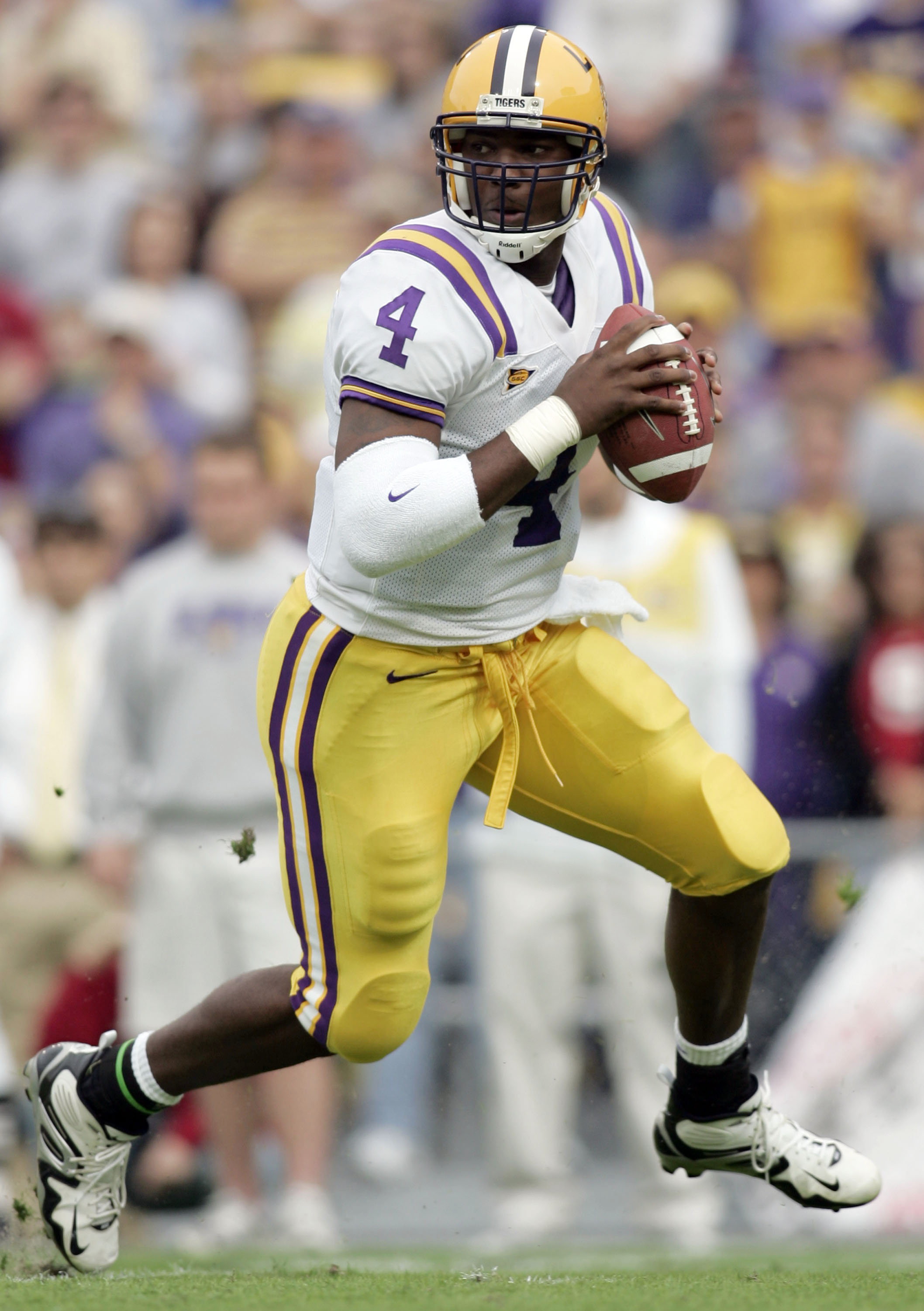 BATON ROUGE, LA - NOVEMBER 25: Quarterback JaMarcus Russell #4 of the LSU Tigers scrambles against the Arkansas Razorbacks on November 25, 2005 at Tiger Stadium in Baton Rouge, Louisiana. LSU defeated Arkansas 19-17. (Photo by Chris Graythen/Getty Image