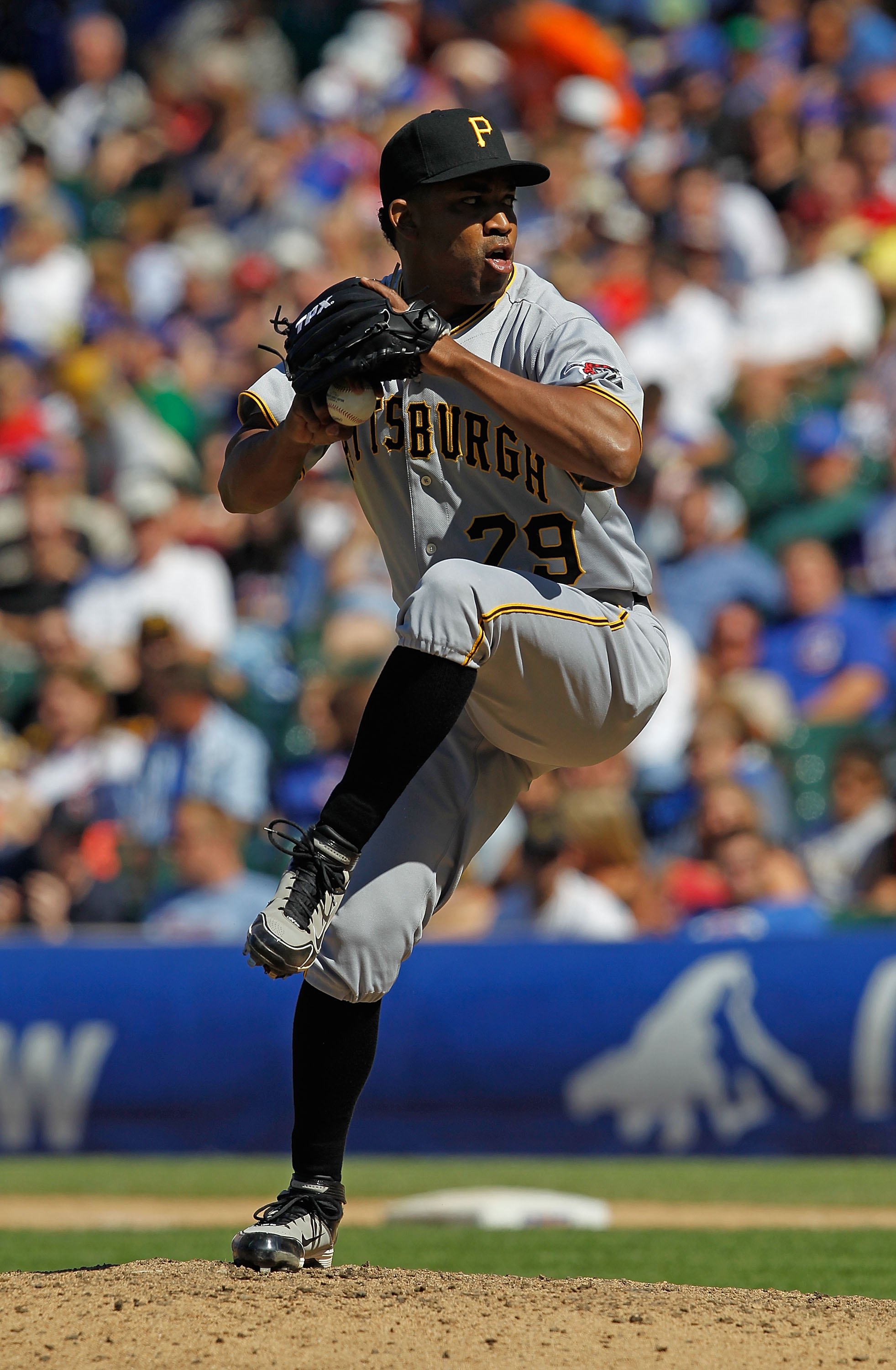 CHICAGO - JUNE 30: Octavio Dotel #29 of the Pittsburgh Pirates pitches in the 9th inning on his way to a save against the Chicago Cubs at Wrigley Field on June 30, 2010 in Chicago, Illinois. The Pirates defeated the Cubs 2-0. (Photo by Jonathan Daniel/Get