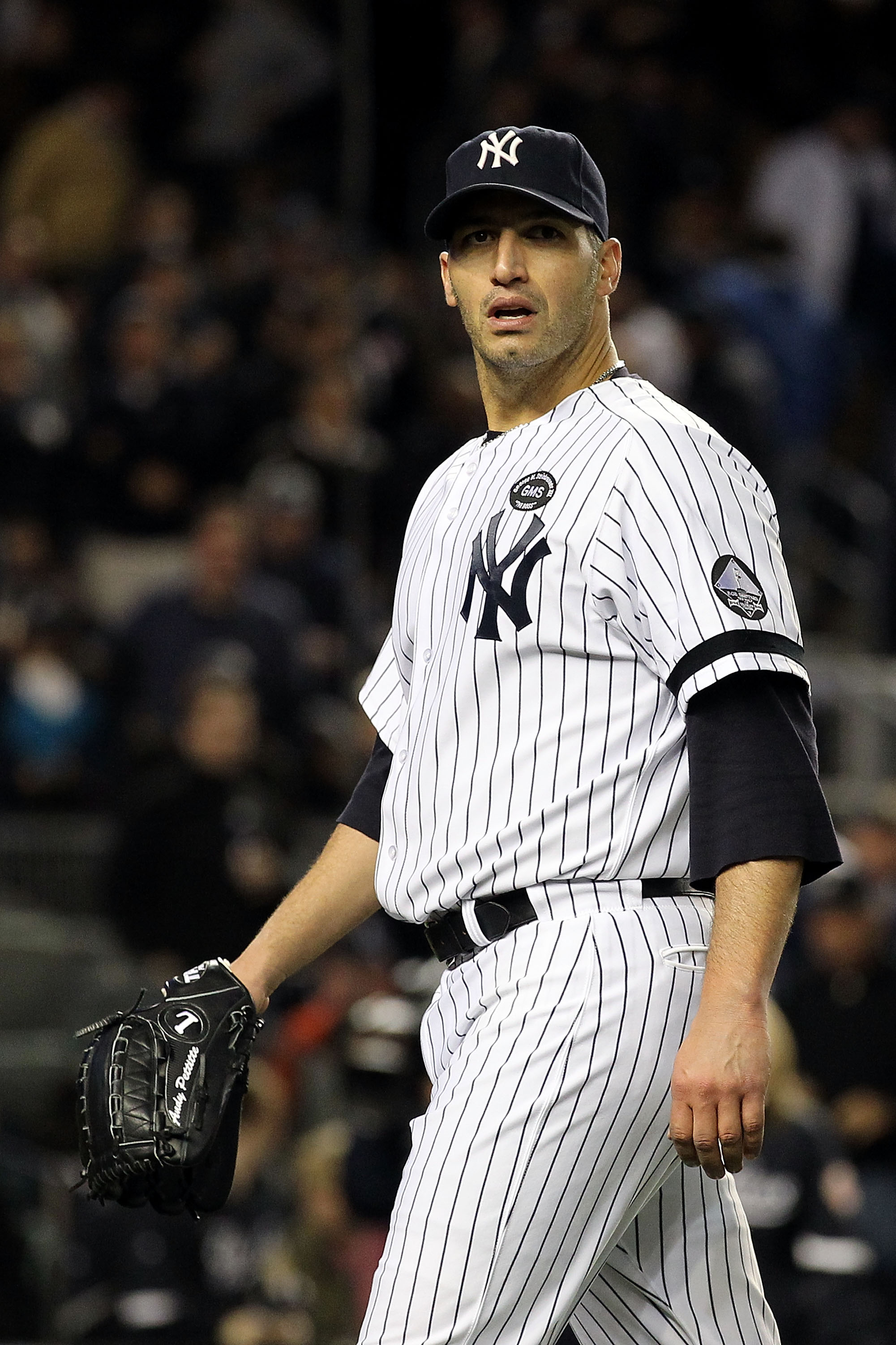 NEW YORK - OCTOBER 18:  Andy Pettitte #46 of the New York Yankees walks back to the dugout at the end of the top of the seventh inning against the Texas Rangers in Game Three of the ALCS during the 2010 MLB Playoffs at Yankee Stadium on October 18, 2010 i