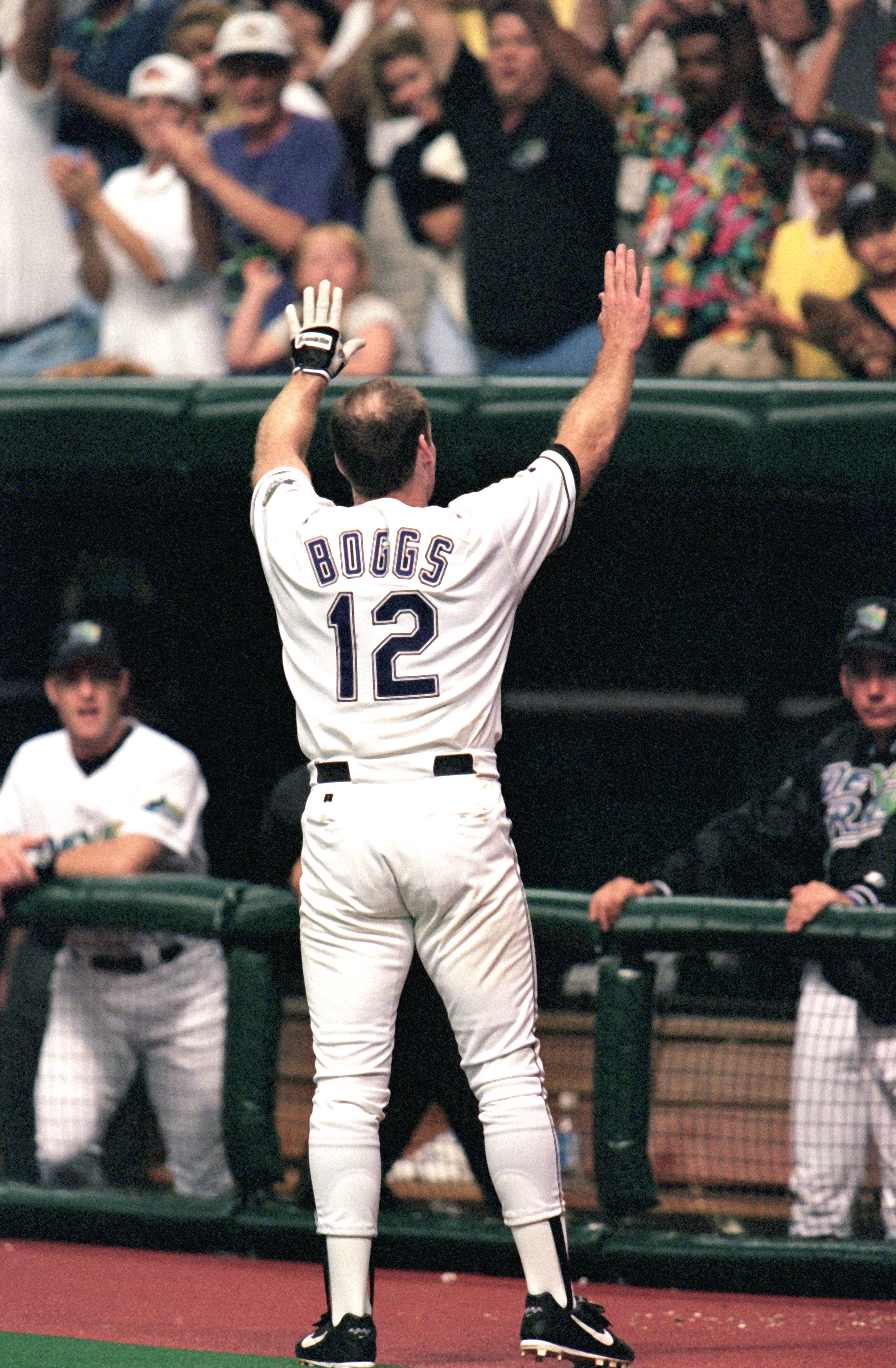 ST. PETERSBURG, FL - AUGUST 7:  Wade Boggs #12 of the Tampa Bay Devils Rays celebrates hitting his 3000th hit with his second home run of the season during the sixth inning against the Cleveland Indians during a game at Tropicana Field on August 7, 1999 i