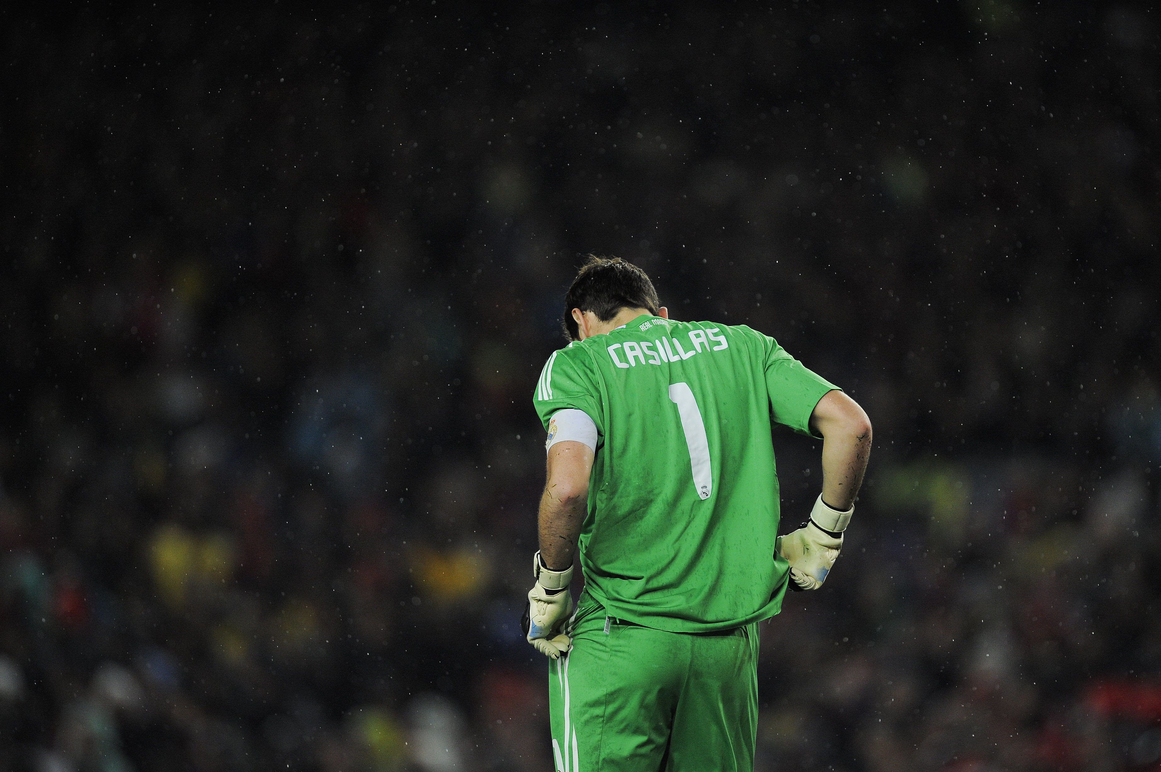 BARCELONA, SPAIN - NOVEMBER 29:  Iker Casillas of Real Madrid looks down after Pedro Rodriguez scored the second goal against Real Madrid during the La Liga match between Barcelona and Real Madrid at the Camp Nou Stadium on November 29, 2010 in Barcelona,