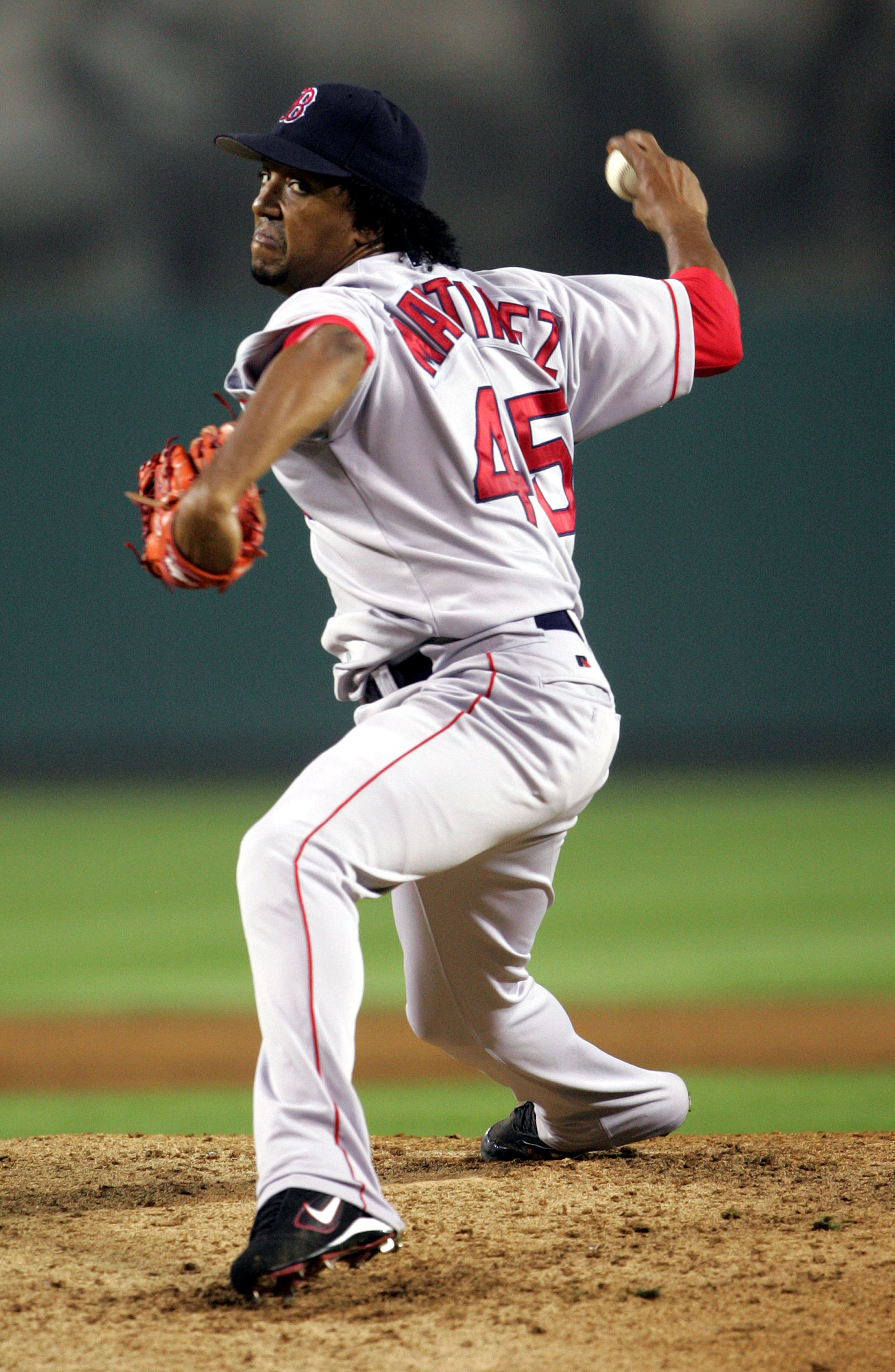 ANAHEIM, CA - OCTOBER 6:  Pitcher Pedro Martinez #45 of the Boston Red Sox delivers a pitch during the American League Division Series with the Anaheim Angels, Game Two on October 6, 2004 at Angels Stadium at Anaheim in Anaheim, California.   (Photo by St