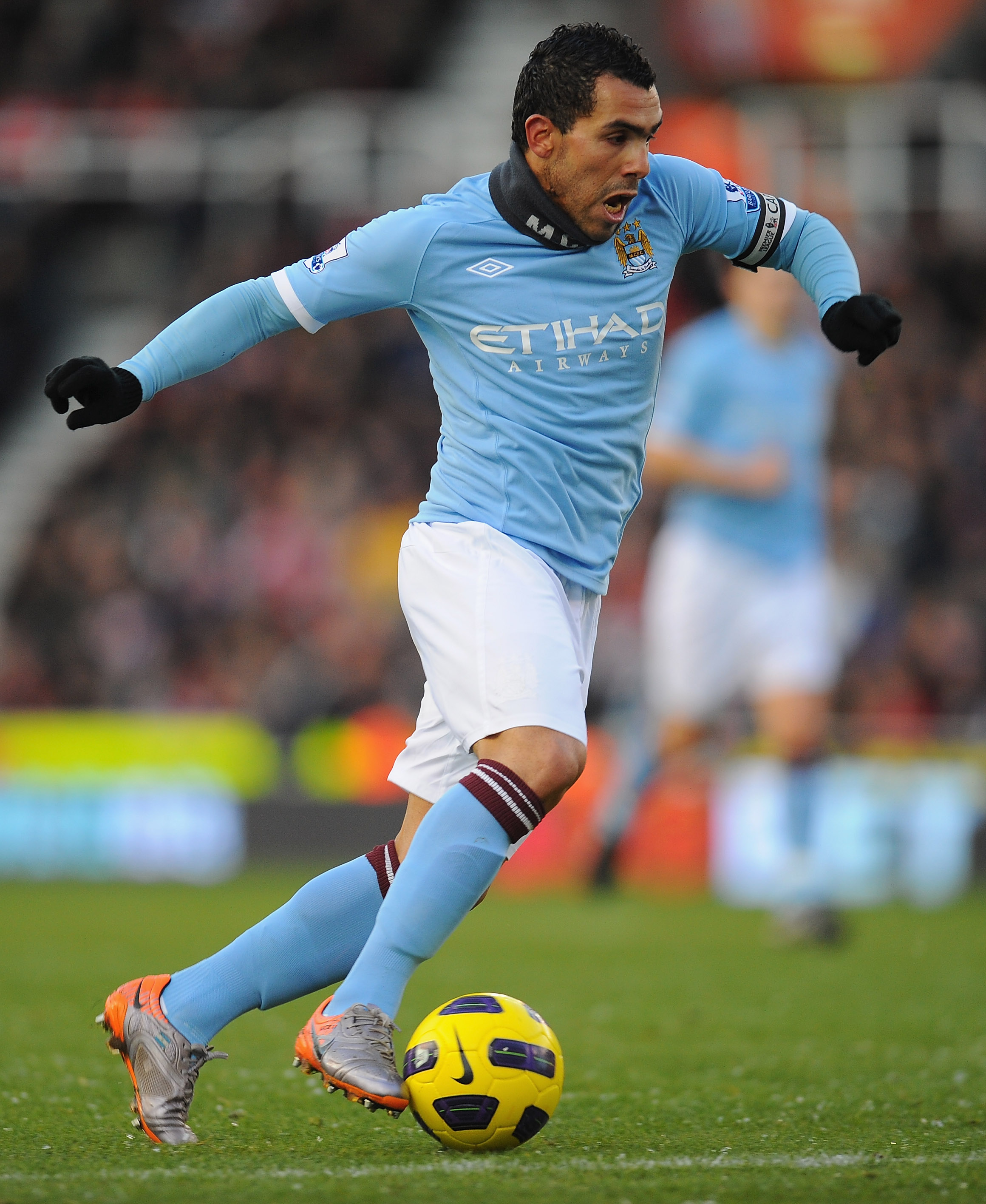 STOKE ON TRENT, ENGLAND - NOVEMBER 27:  Carlos Tevez of Manchester City in action during the Barclays Premier League match between Stoke City and Manchester City at Britannia Stadium on November 27, 2010 in Stoke on Trent, England.  (Photo by Clive Mason/