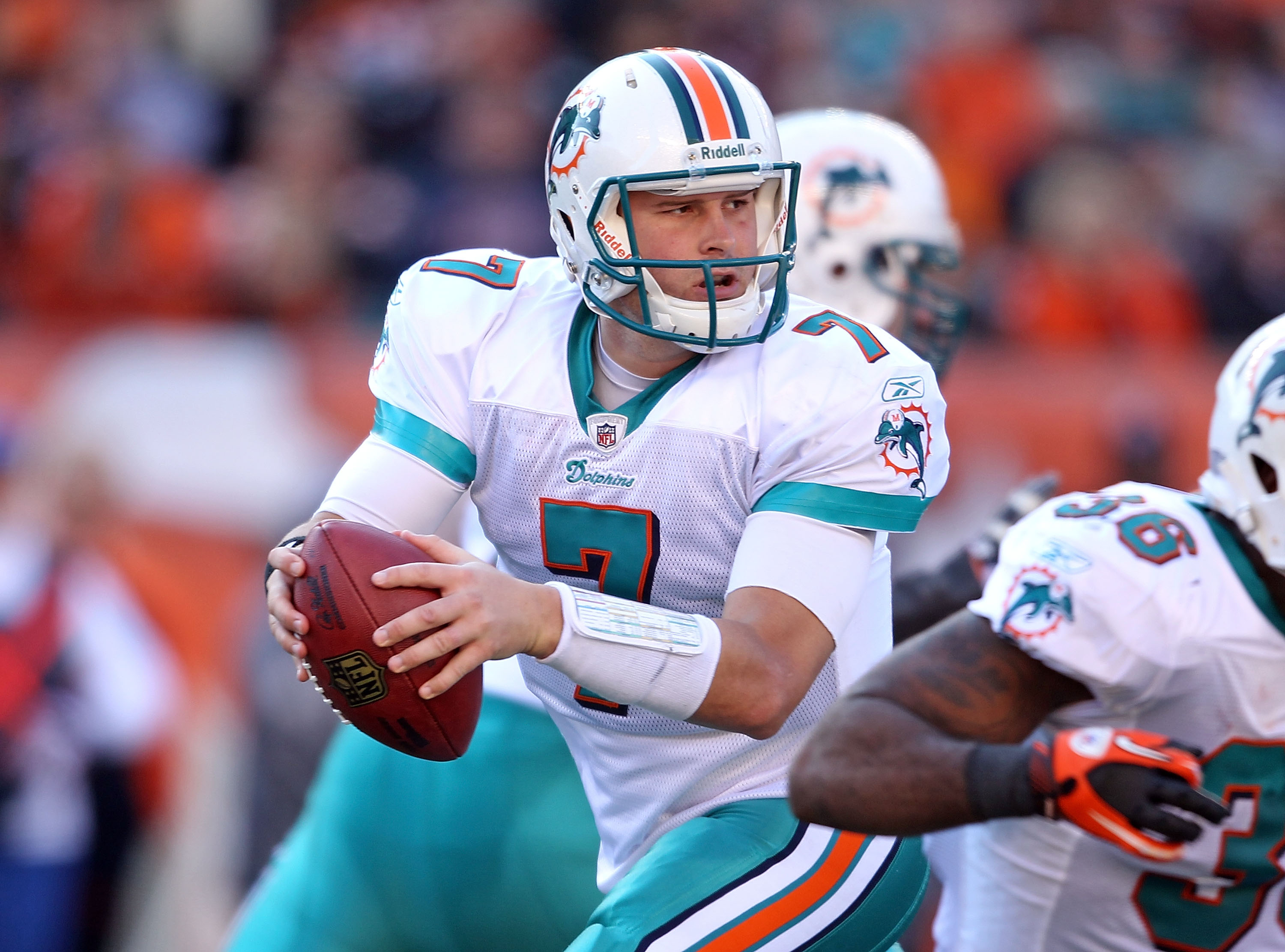 Miami Dolphins - Quarterback Chad Henne (7) hands off to running