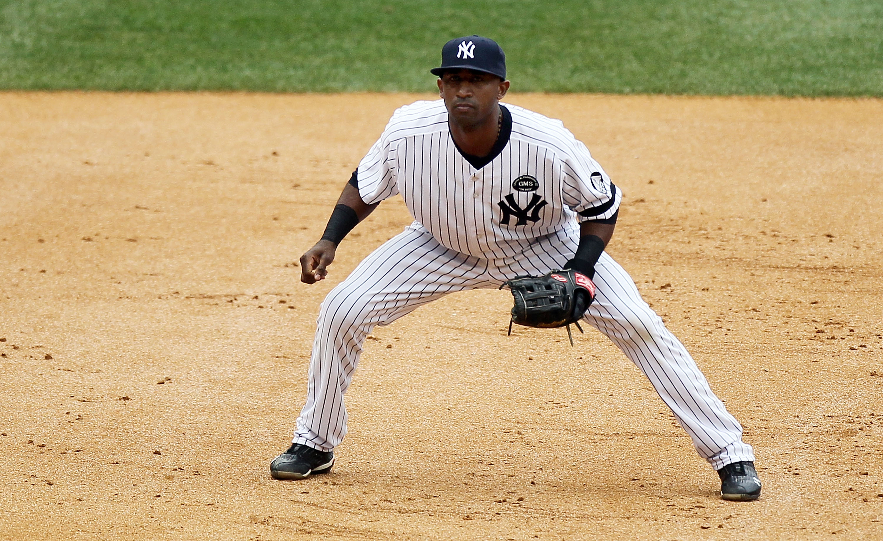NEW YORK - AUGUST 22:  Eduardo Nunez #12 of the New York Yankees in action against the Seattle Mariners on August 22, 2010 at Yankee Stadium in the Bronx borough of New York City.The Yankees defeated the Mariners 10-0.  (Photo by Jim McIsaac/Getty Images)