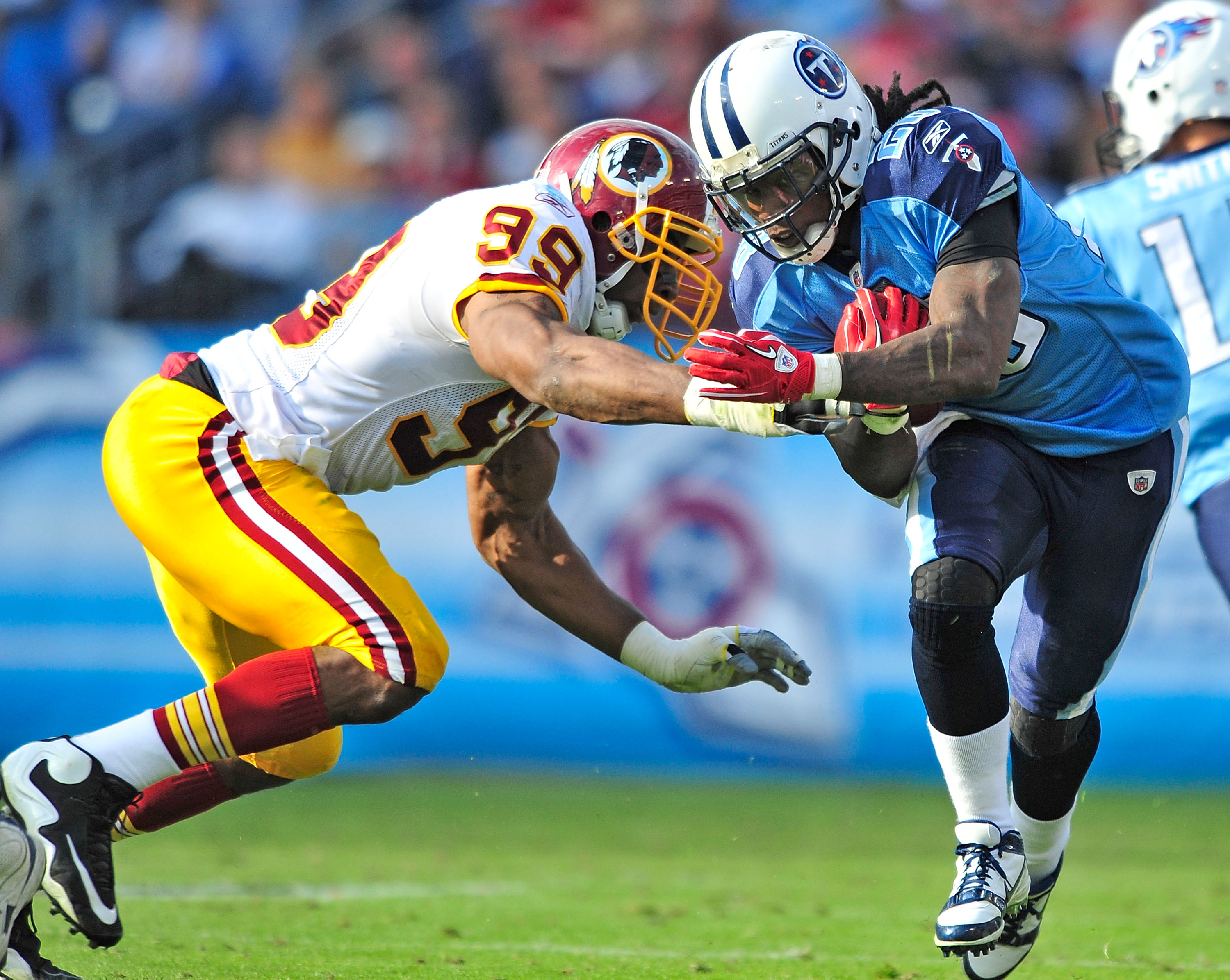 Tennessee Titans wide receiver Randy Moss (84) watches from the sideline in  overtime during an NFL football game against the Washington Redskins on  Sunday, Nov. 21, 2010, in Nashville, Tenn. The Redskins