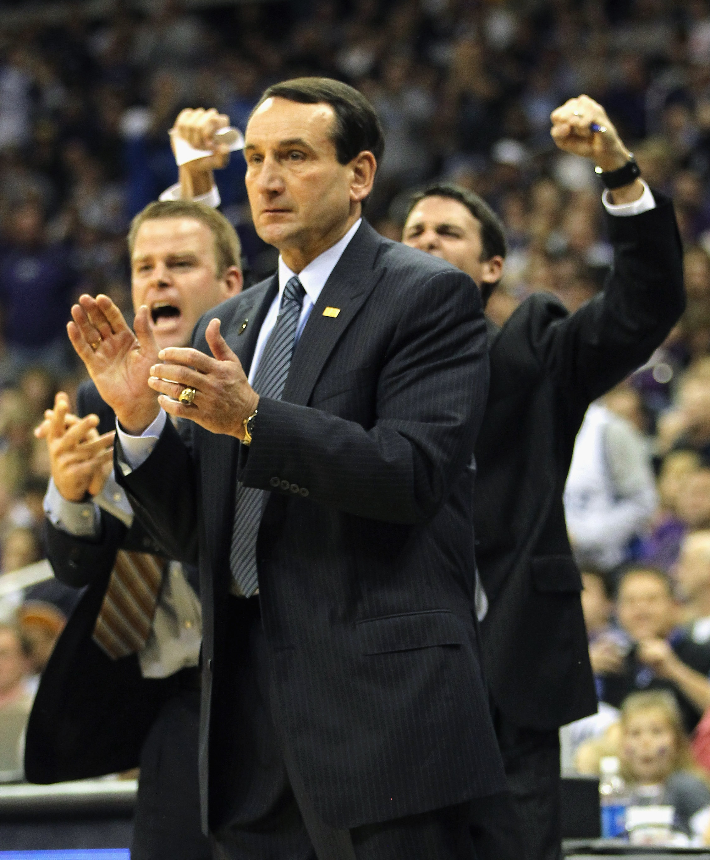 KANSAS CITY, MO - NOVEMBER 23:  Head coach Mike Krzyzewski of the Duke Blue Devils and assistant coaches react to a play during the CBE Classic championship game against the Kansas State Wildcats on November 23, 2010 at the Sprint Center in Kansas City, M