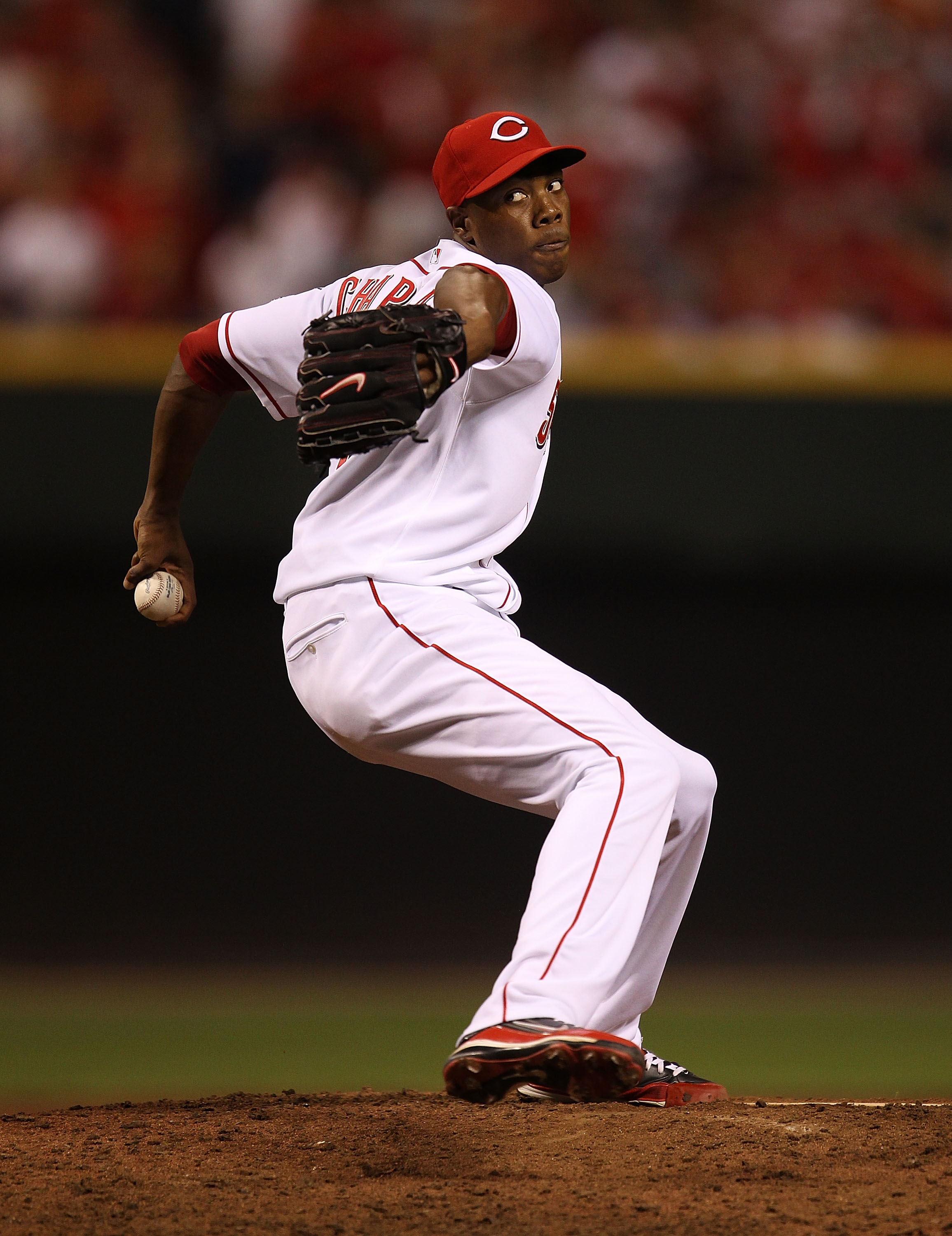 CINCINNATI - OCTOBER 10: Aroldis Chapman #54 of the Cincinnati Reds pitches in the 9th inning against the Philadelphia Phillies during game 3 of the NLDS at Great American Ball Park on October 10, 2010 in Cincinnati, Ohio. The Phillies defeated the Reds 2