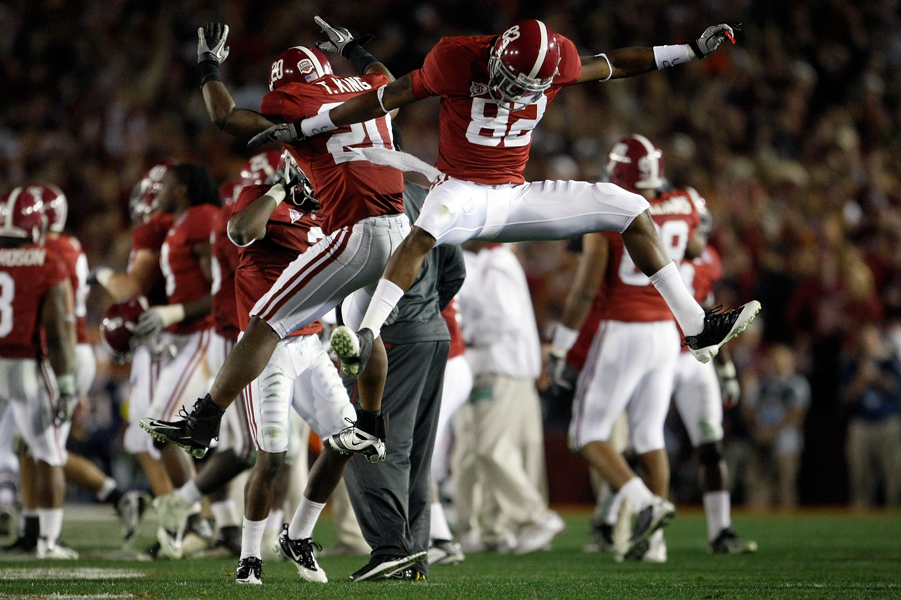 PASADENA, CA - JANUARY 07:  Cornerback Tyrone King #20 and wide receiver Earl Alexander #82 of the Alabama Crimson Tide celebrate during the Citi BCS National Championship game against the Texas Longhorns at the Rose Bowl on January 7, 2010 in Pasadena, C