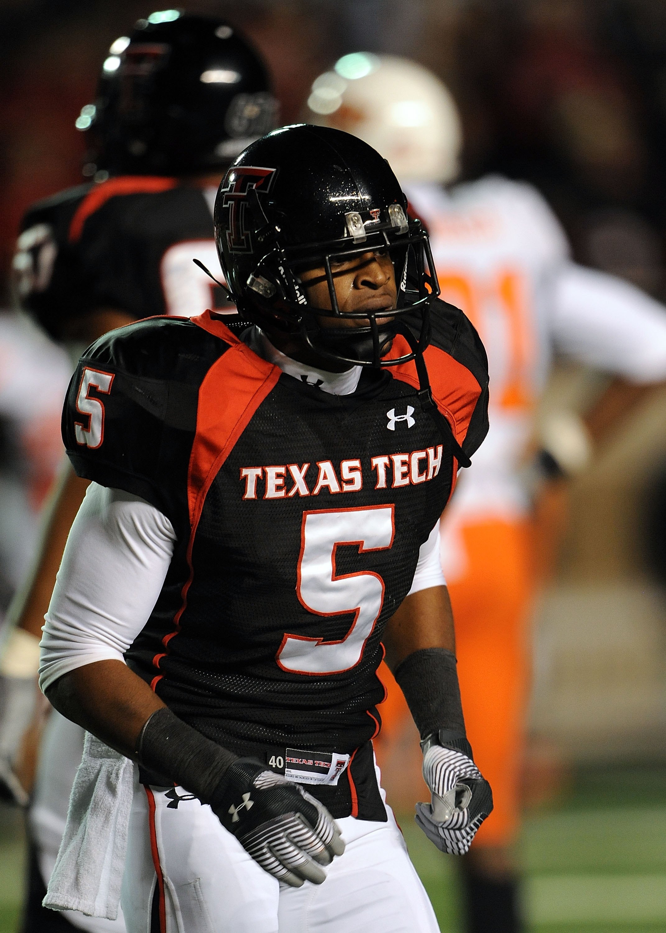 LUBBOCK, TX - NOVEMBER 08:  Wide receiver Michael Crabtree #5 of the Texas Tech Red Raiders during play against the Oklahoma State Cowboys at Jones AT&T Stadium on November 8, 2008 in Lubbock, Texas.  (Photo by Ronald Martinez/Getty Images)