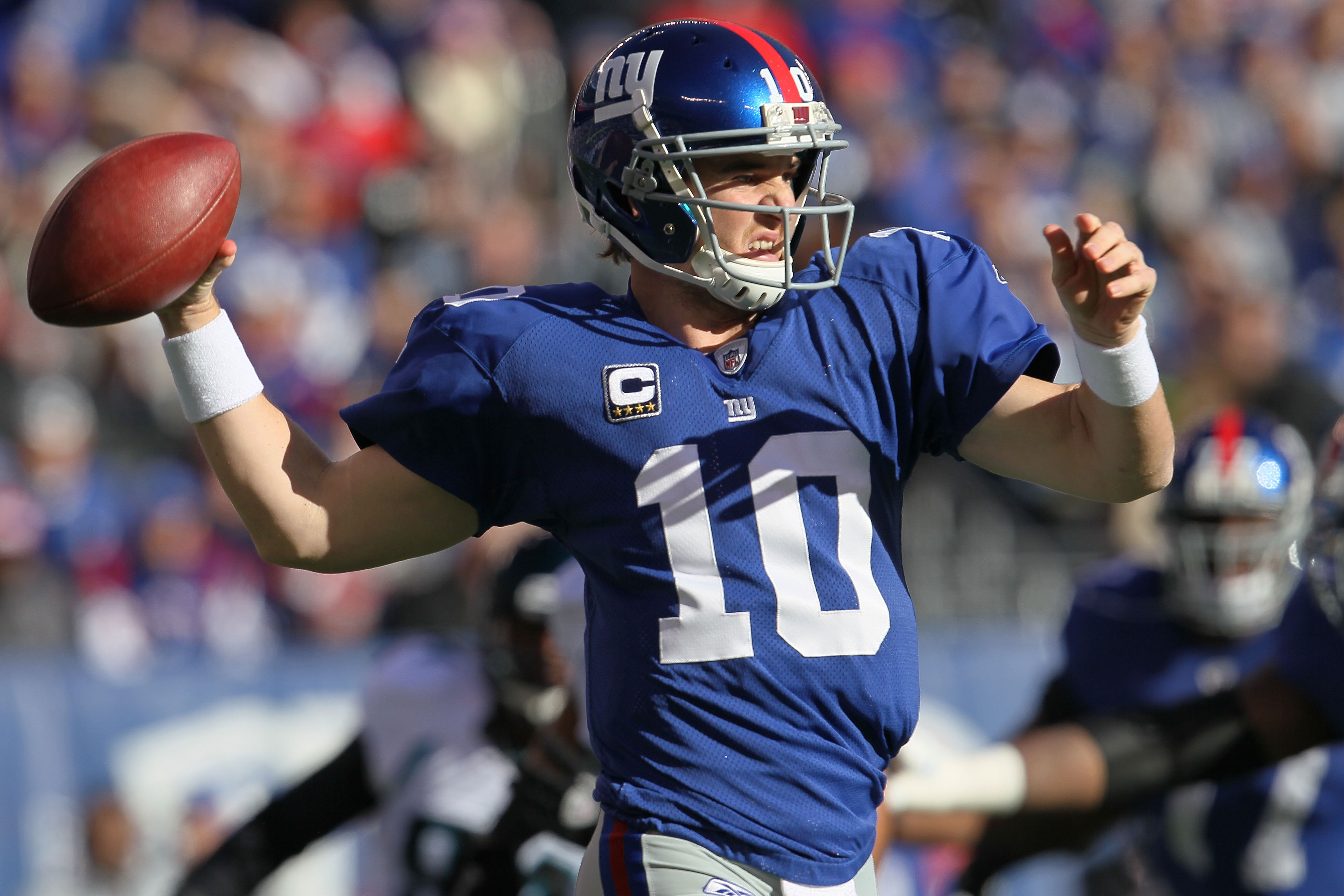 New York Giants Eli Manning releases a pass in week 13 at Giants Stadium in  East Rutherford, New Jersey on December 4, 2005. The New York Giants  defeated the Dallas Cowboys 17-10. (