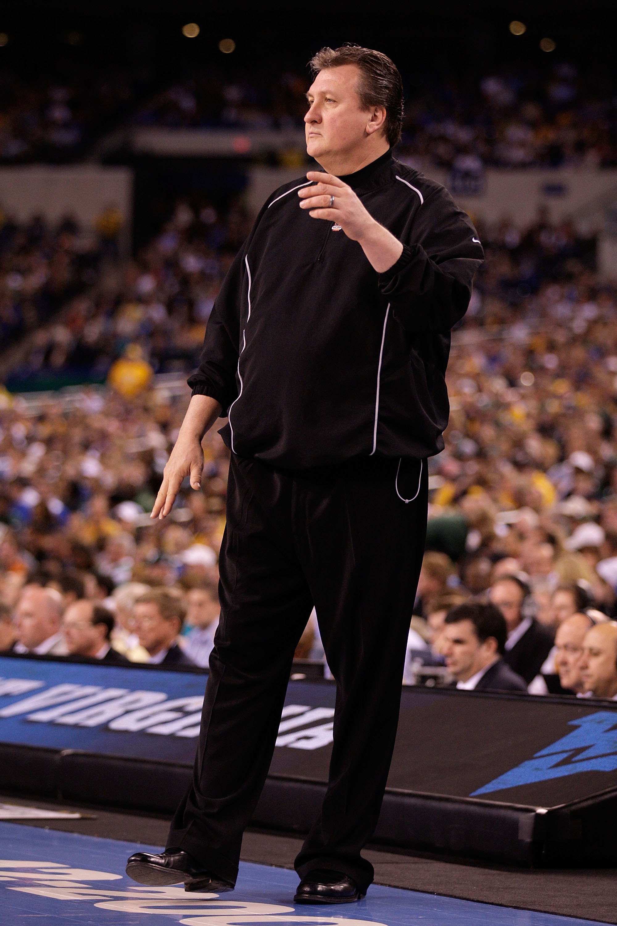 INDIANAPOLIS - APRIL 03:  Head coach Bob Huggins of the West Virginia Mountaineers reacts while taking on the Duke Blue Devils during the National Semifinal game of the 2010 NCAA Division I Men's Basketball Championship at Lucas Oil Stadium on April 3, 20