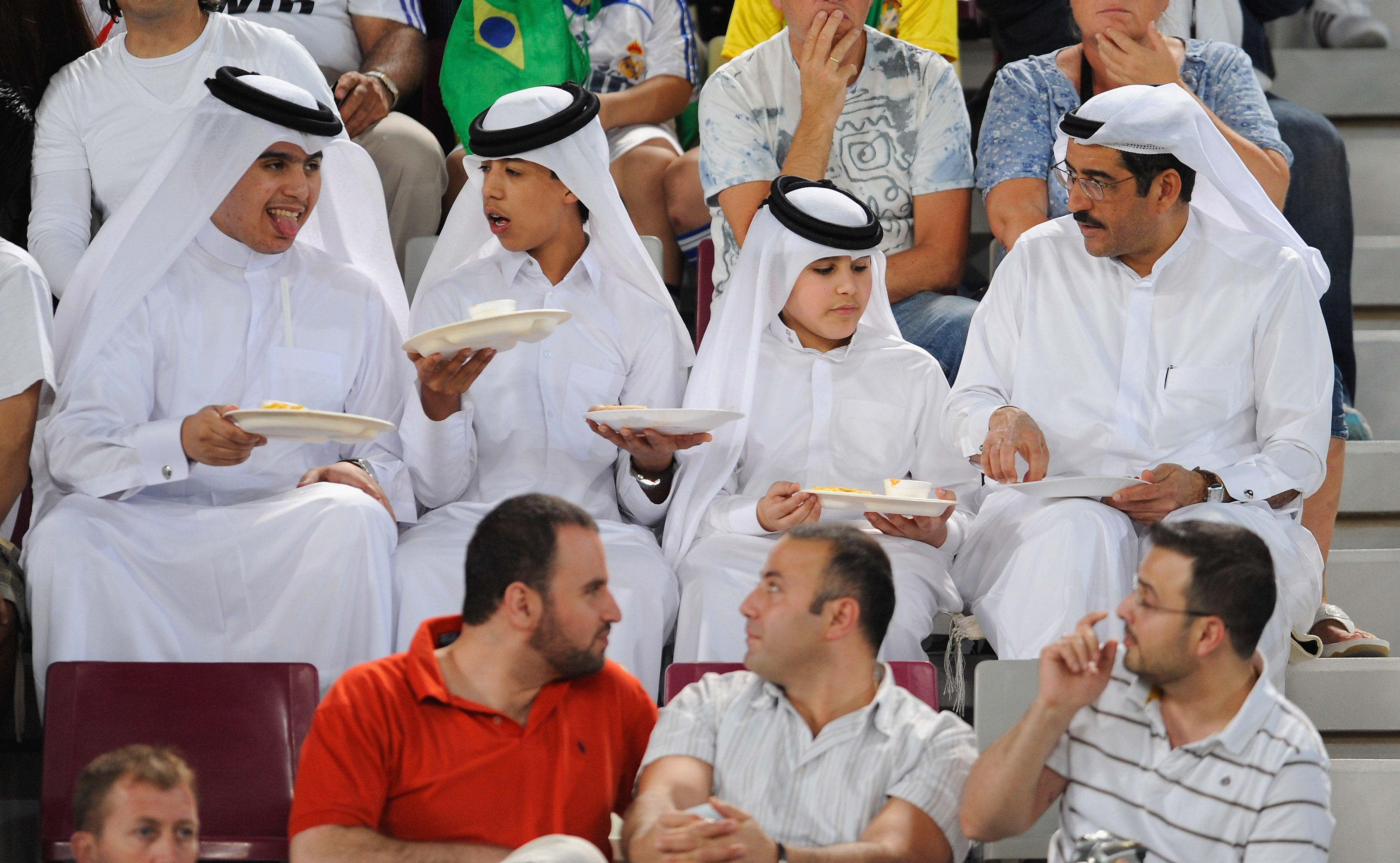 DOHA, QATAR - NOVEMBER 14: Local fans during the International Friendly match between Brazil and England at the Khalifa Stadium on November 14, 2009 in Doha, Qatar.  (Photo by Michael Regan/Getty Images)