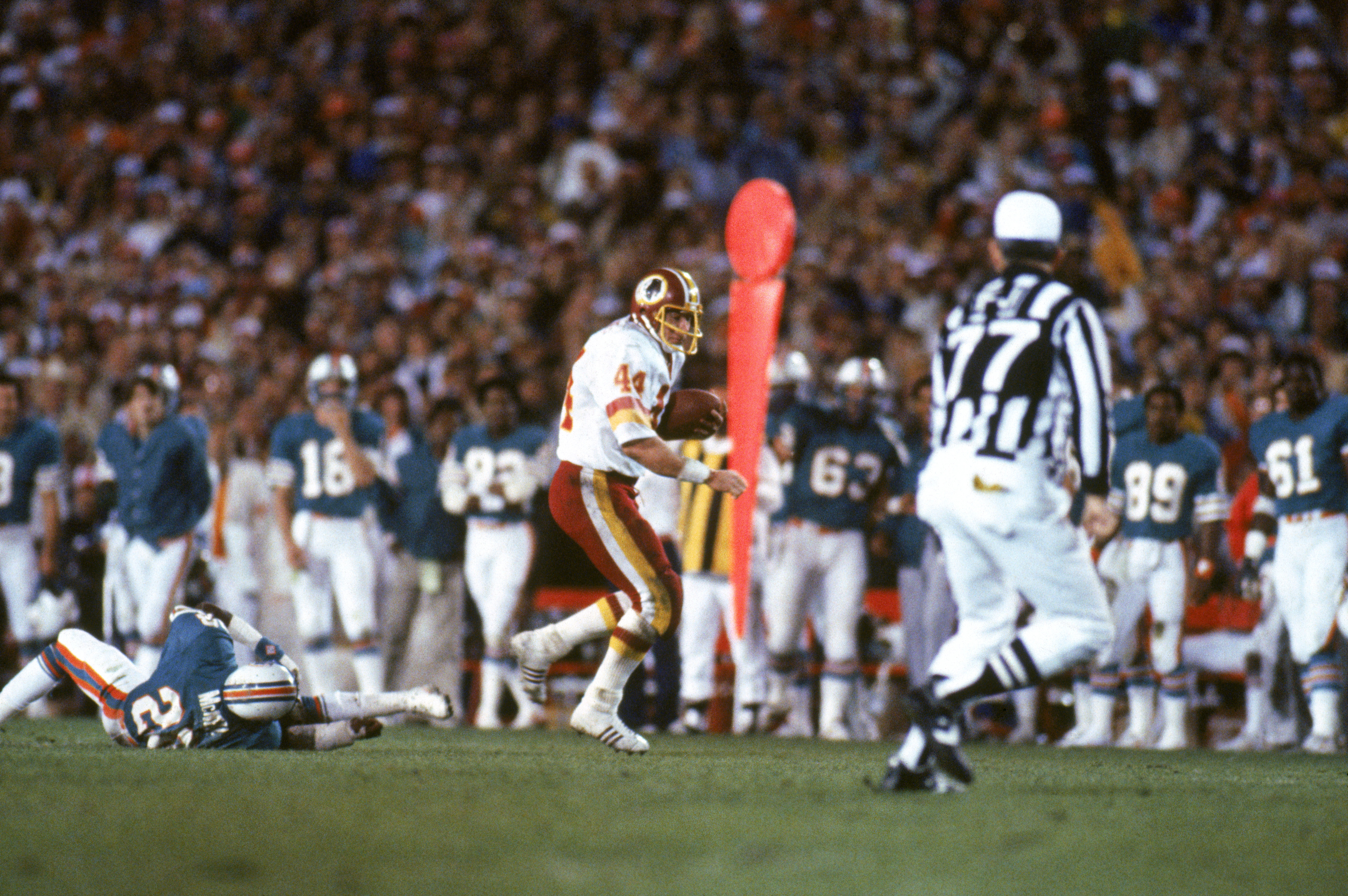 PASADENA, CA - JANUARY 30:  Running back John Riggins #44 of the Washington Redskins rushes for yards during Super Bowl XVII against the Miami Dolphins at the Rose Bowl on January 30, 1983 in Pasadena, California.  John Riggins was named Super Bowl MVP as
