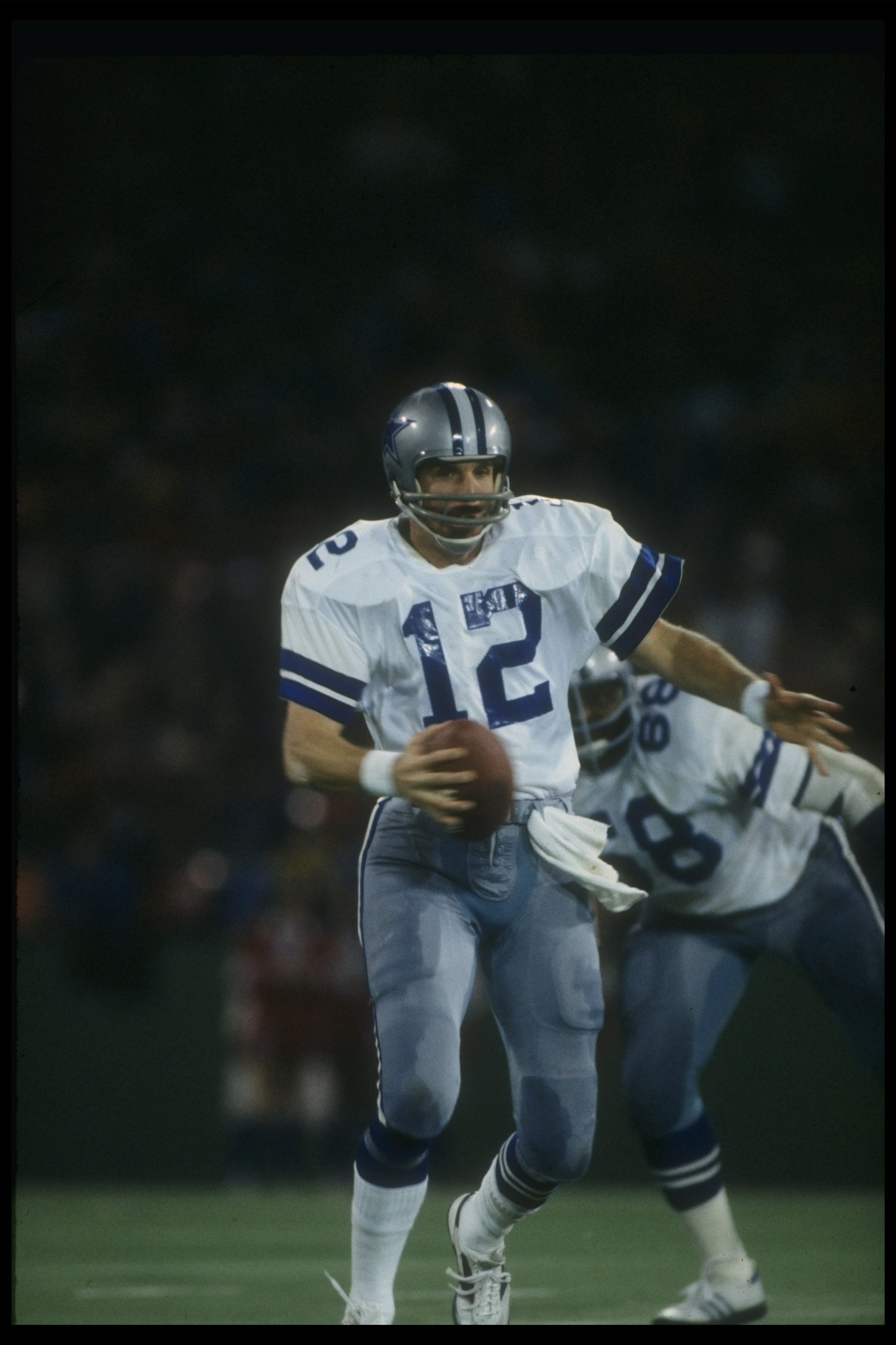 1978:  Quarterback Roger Staubach of the Dallas Cowboys looks to pass the ball during a game. Mandatory Credit: Allsport  /Allsport