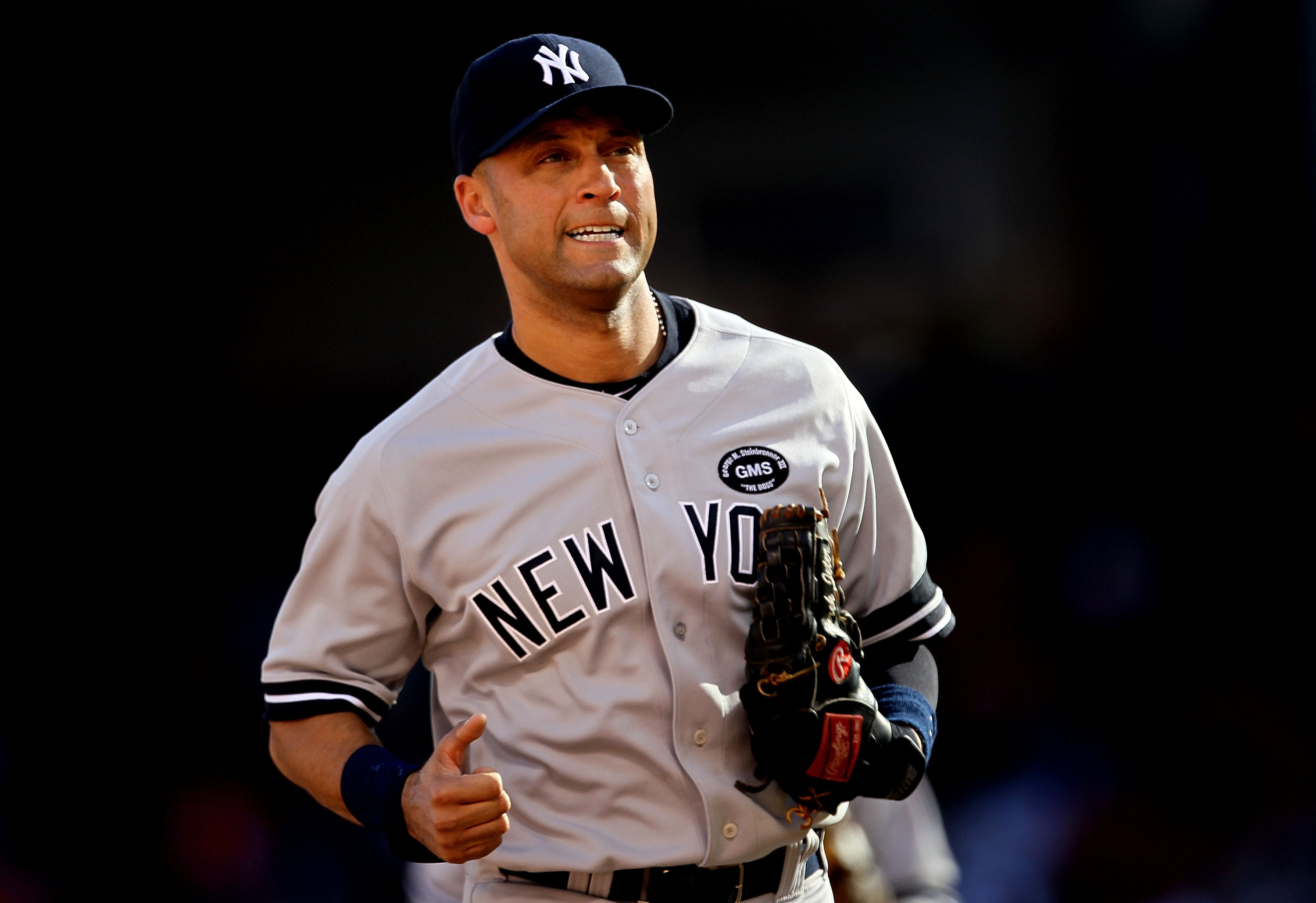ARLINGTON, TX - OCTOBER 16:  Derek Jeter #2 of the New York Yankees looks on against the Texas Rangers in Game Two of the ALCS during the 2010 MLB Playoffs at Rangers Ballpark in Arlington on October 16, 2010 in Arlington, Texas.  (Photo by Stephen Dunn/G