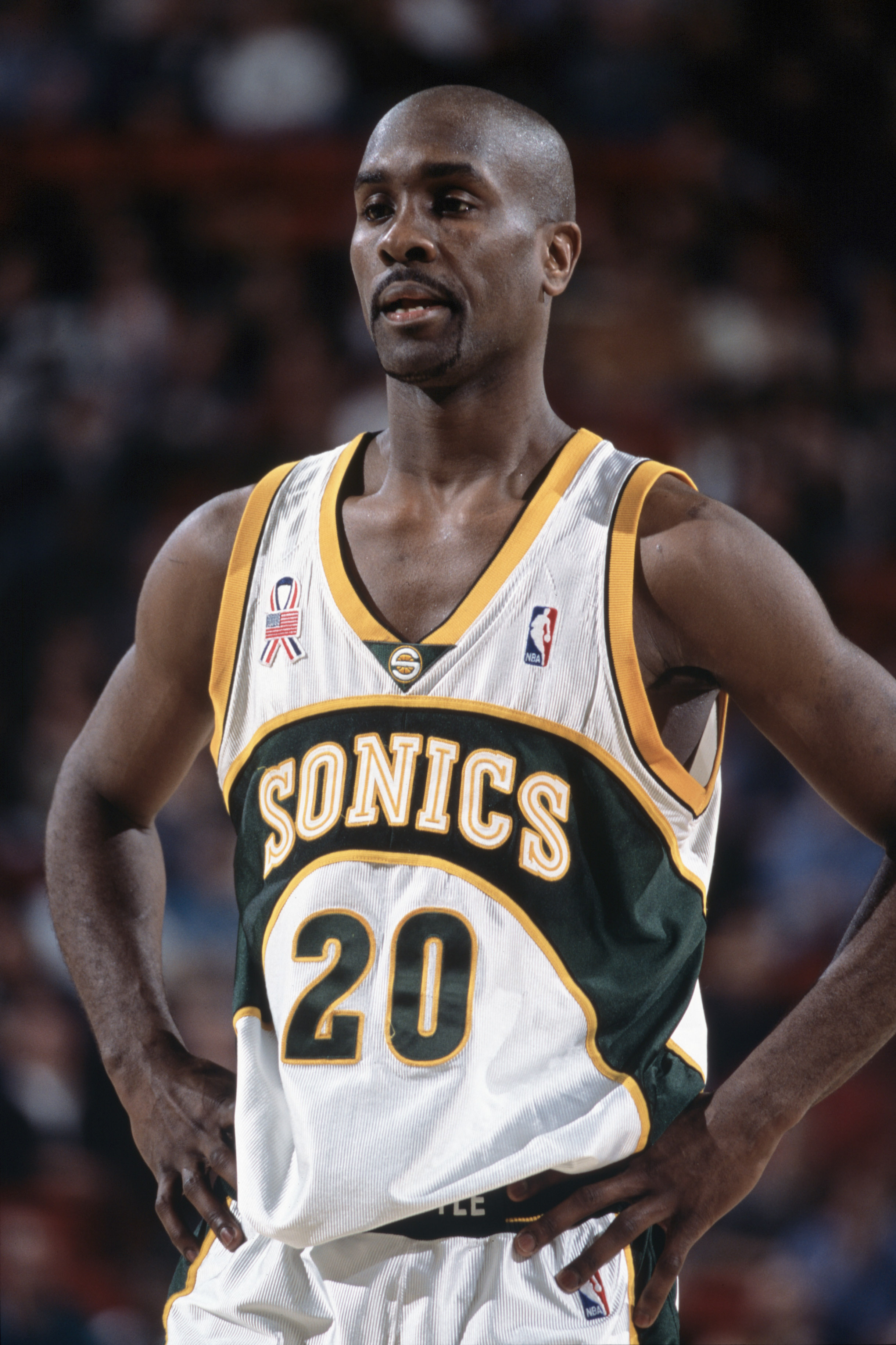 19 Dec 2001:  Point guard Gary Payton #20 of the Seattle SuperSonics rests during the NBA game against the Sacramento Kings at Key Arena in Seattle, Washington.  The SuperSonics defeated the Kings 104-92.Mandatory Credit:  Otto Greule/Getty Images