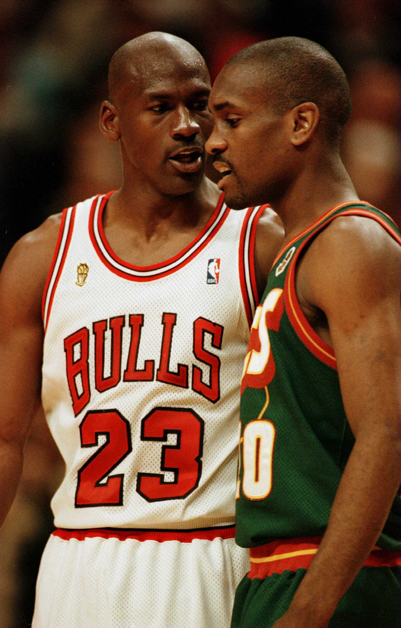 7 Jun 1996:   Michael Jordan of the Chicago Bulls and Gary Payton of the Seattle Supersonics exchange words during the final seconds of game two in the NBA Finals at the United Center in Chicago. The two players had to be separated by teammates and refere