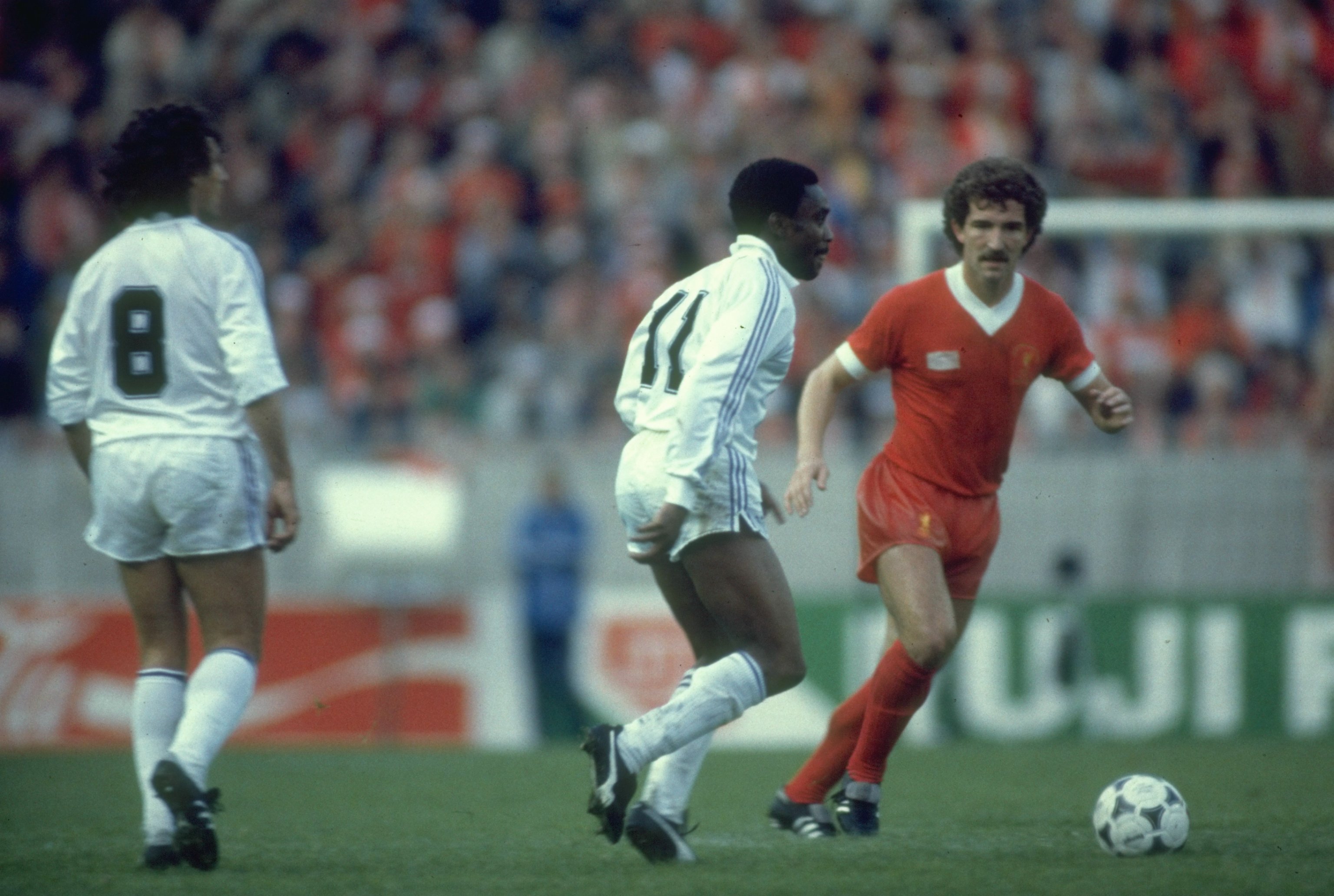 1981:  Graham Souness (right) of Liverpool takes on Laurie Cunningham (left) of Real Madrid during the European Cup final at Parc des Princes in Paris. Liverpool won the match 1-0. \ Mandatory Credit: Allsport UK /Allsport