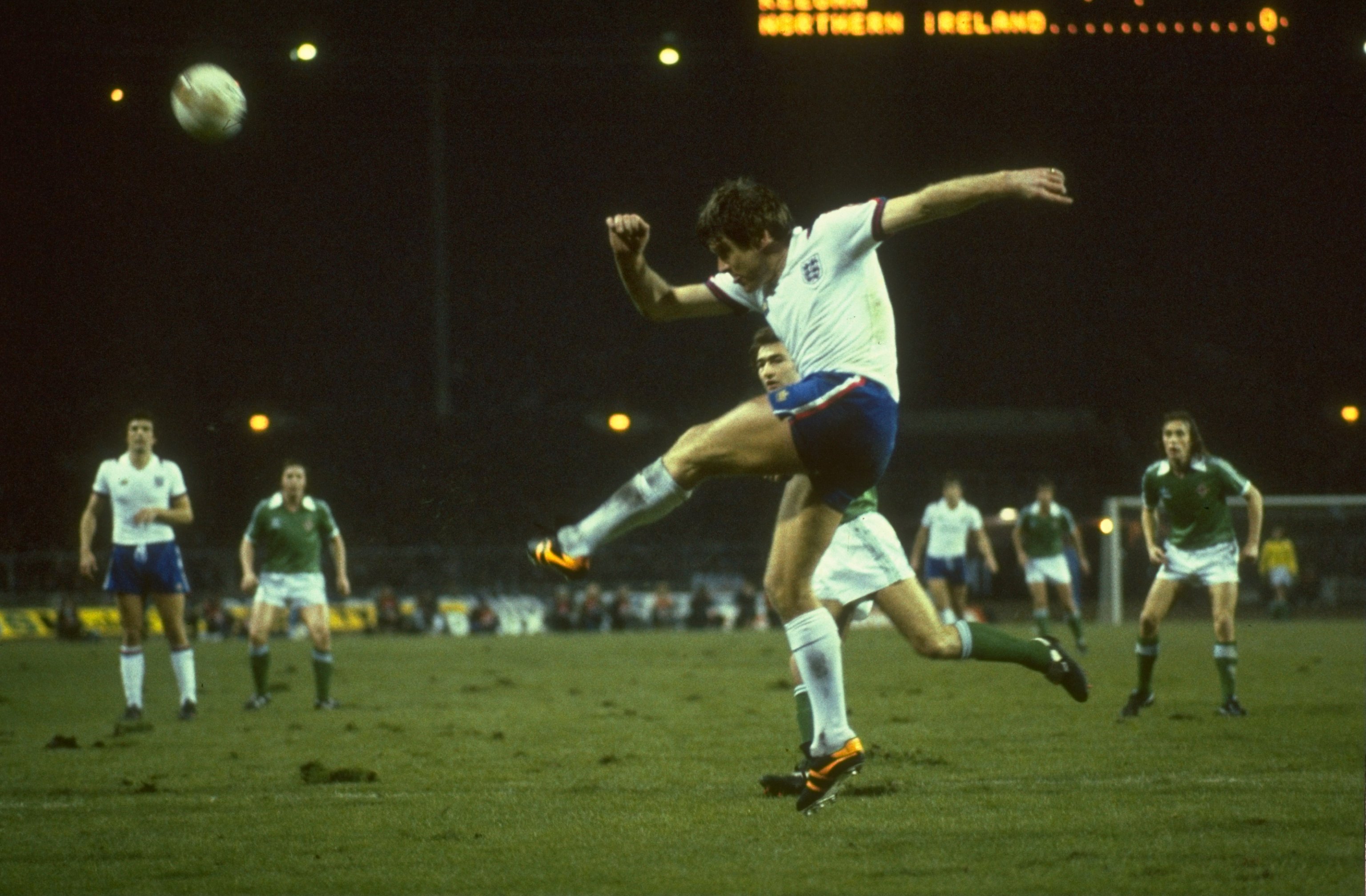 1970:  Emlyn Hughes (centre) of England clears the ball as Martin O''Neil (centre right) of Northern Ireland looks on during the match at Wembley, London. \ Mandatory Credit: Allsport UK /Allsport