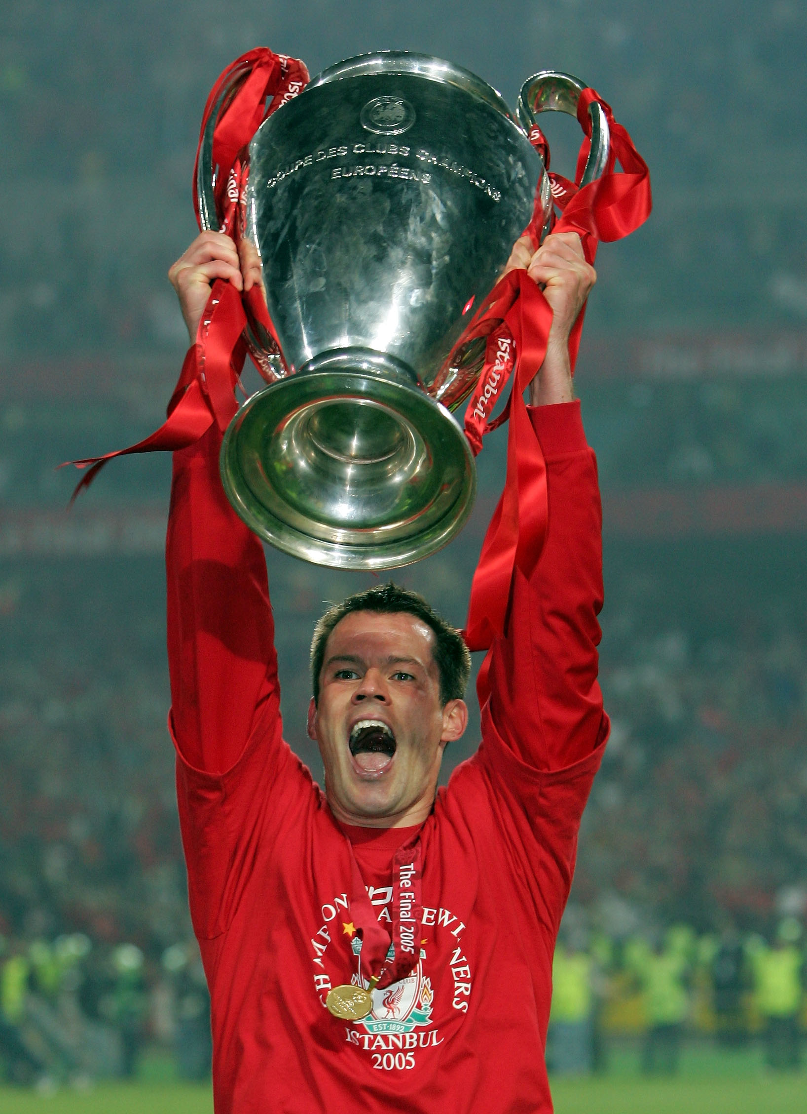 ISTANBUL, TURKEY - MAY 25:  Liverpool defender Jamie Carragher lifts the European Cup after Liverpool won the European Champions League final against AC Milan on May 25, 2005 at the Ataturk Olympic Stadium in Istanbul, Turkey.  (Photo by Alex Livesey/Gett