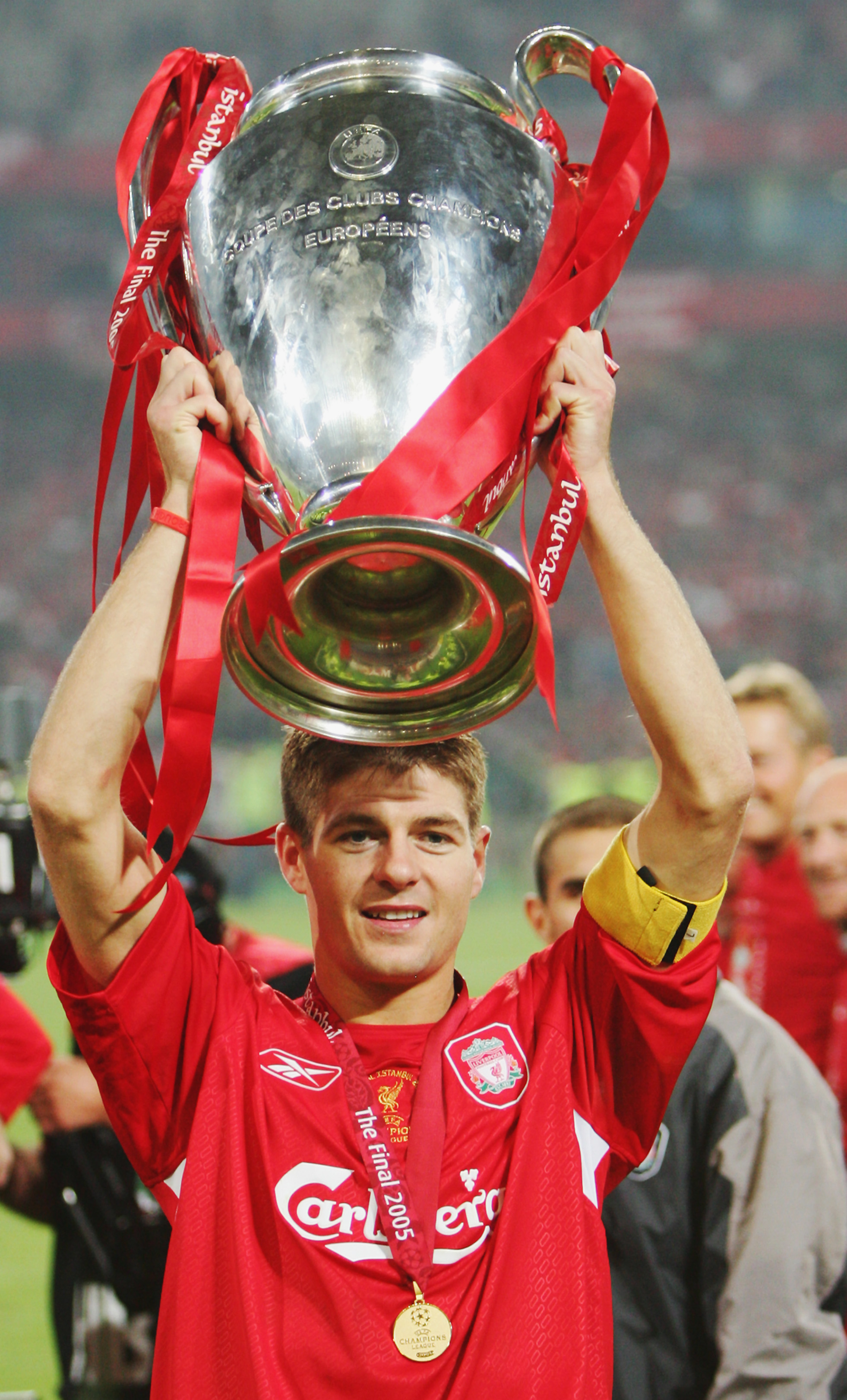 ISTANBUL, TURKEY - MAY 25:  Steven Gerrard of Liverpool celebrates with the trophy following victory in the UEFA Champions League Final between Liverpool and AC Milan on May 25, 2005 at the Ataturk Olympic Stadium in Istanbul, Turkey.  (Photo by Mike Hewi
