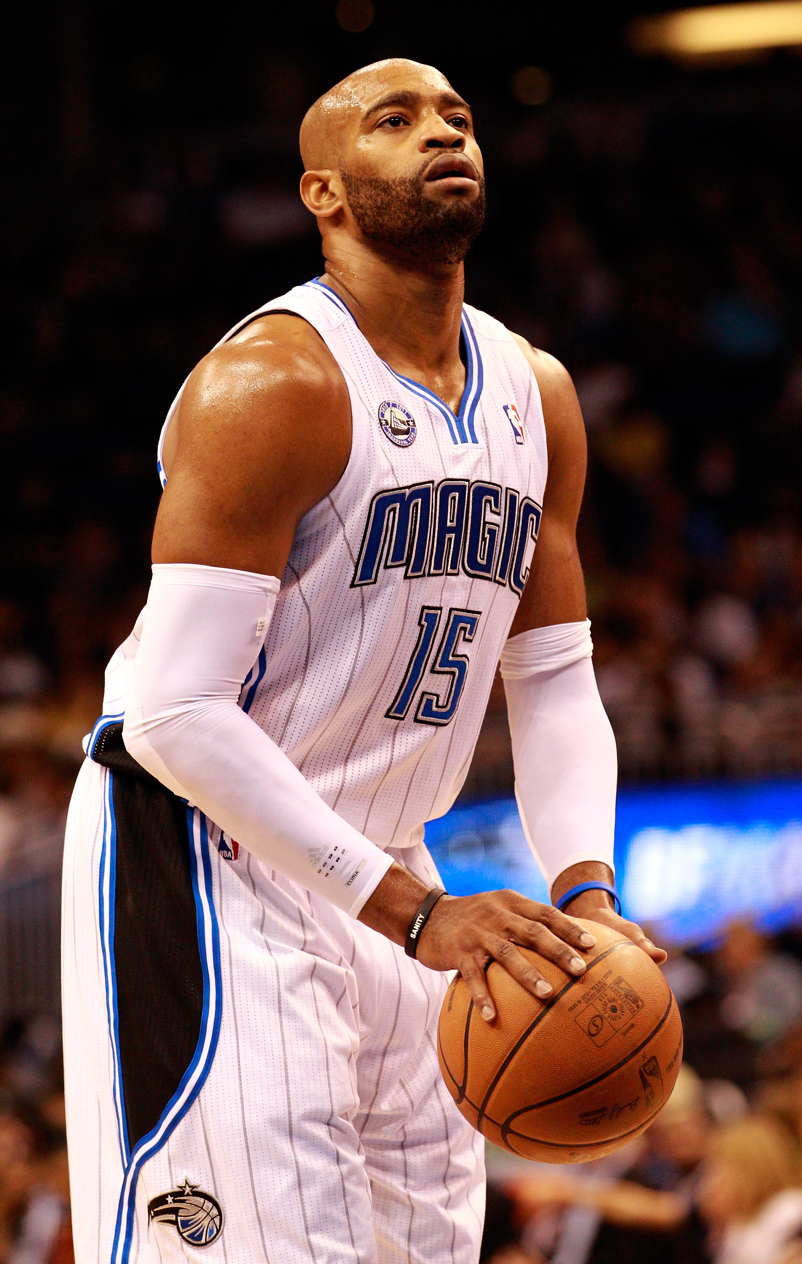 ORLANDO, FL - NOVEMBER 03:  Vince Carter #15 of the Orlando Magic attempts a foul shot during the game against the Minnesota Timberwolves at Amway Arena on November 3, 2010 in Orlando, Florida.  NOTE TO USER: User expressly acknowledges and agrees that, b