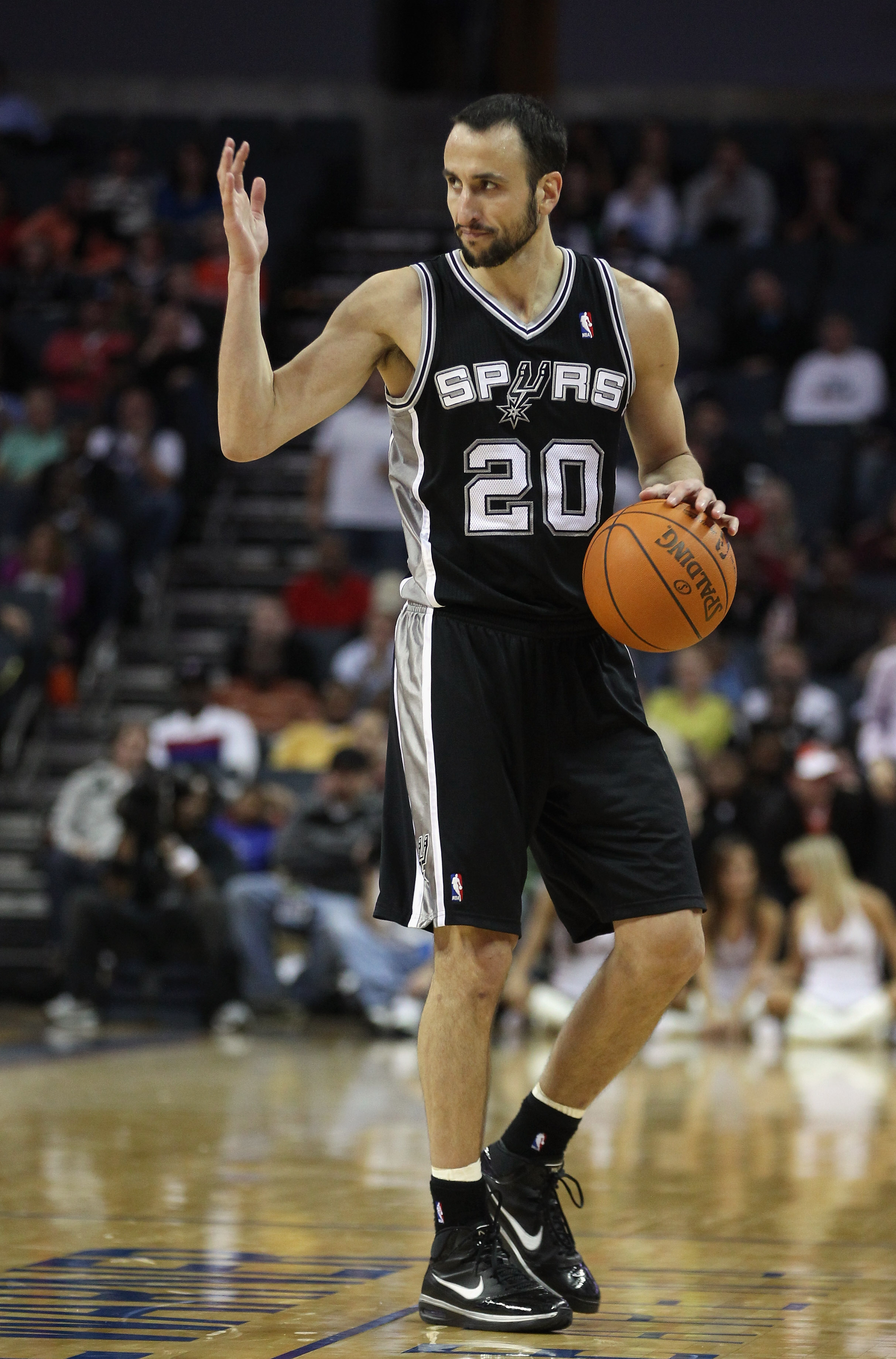 CHARLOTTE, NC - NOVEMBER 08:  Manu Ginobili #20 of the San Antonio Spurs against the Charlotte Bobcats during their game at Time Warner Cable Arena on November 8, 2010 in Charlotte, North Carolina.  NOTE TO USER: User expressly acknowledges and agrees tha